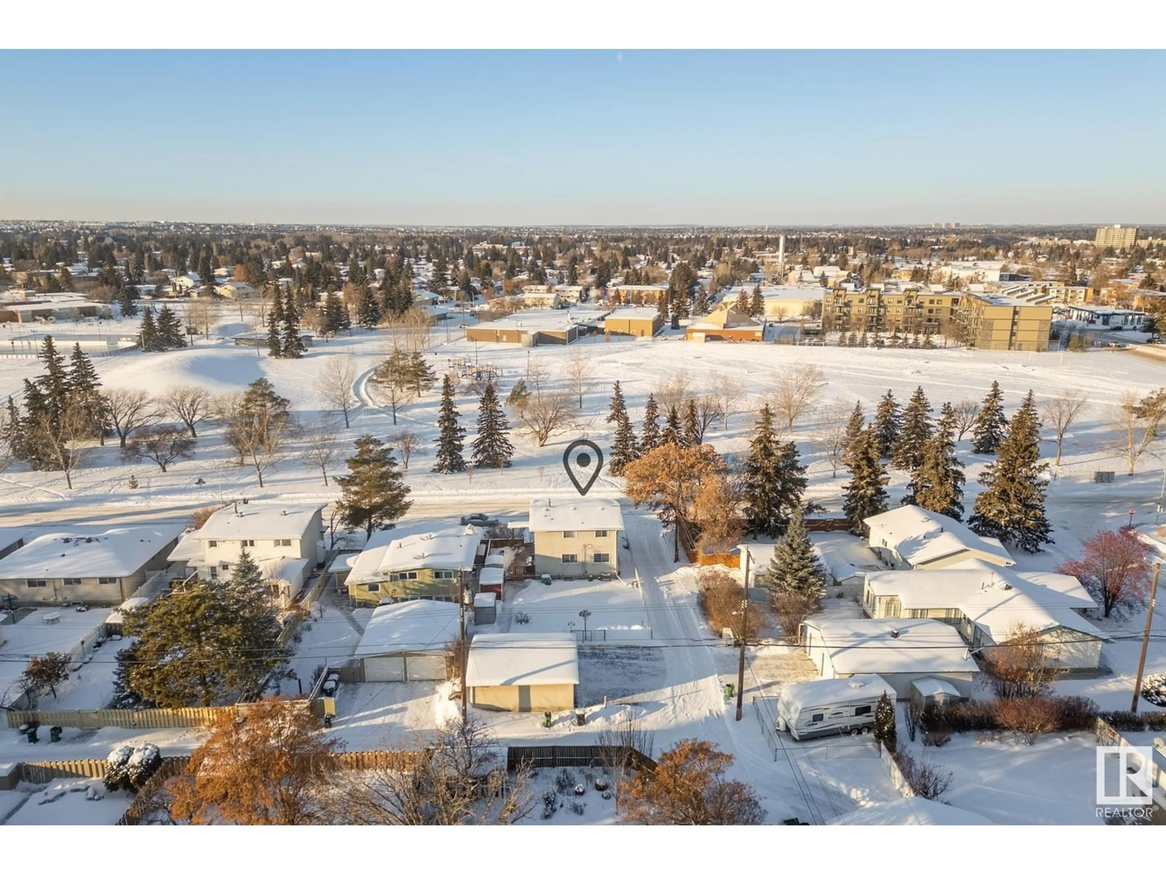 A pic from outside/outdoor area/front of a property/back of a property/a pic from drone, street for 3907 112A ST NW, Edmonton Alberta T6J1K4