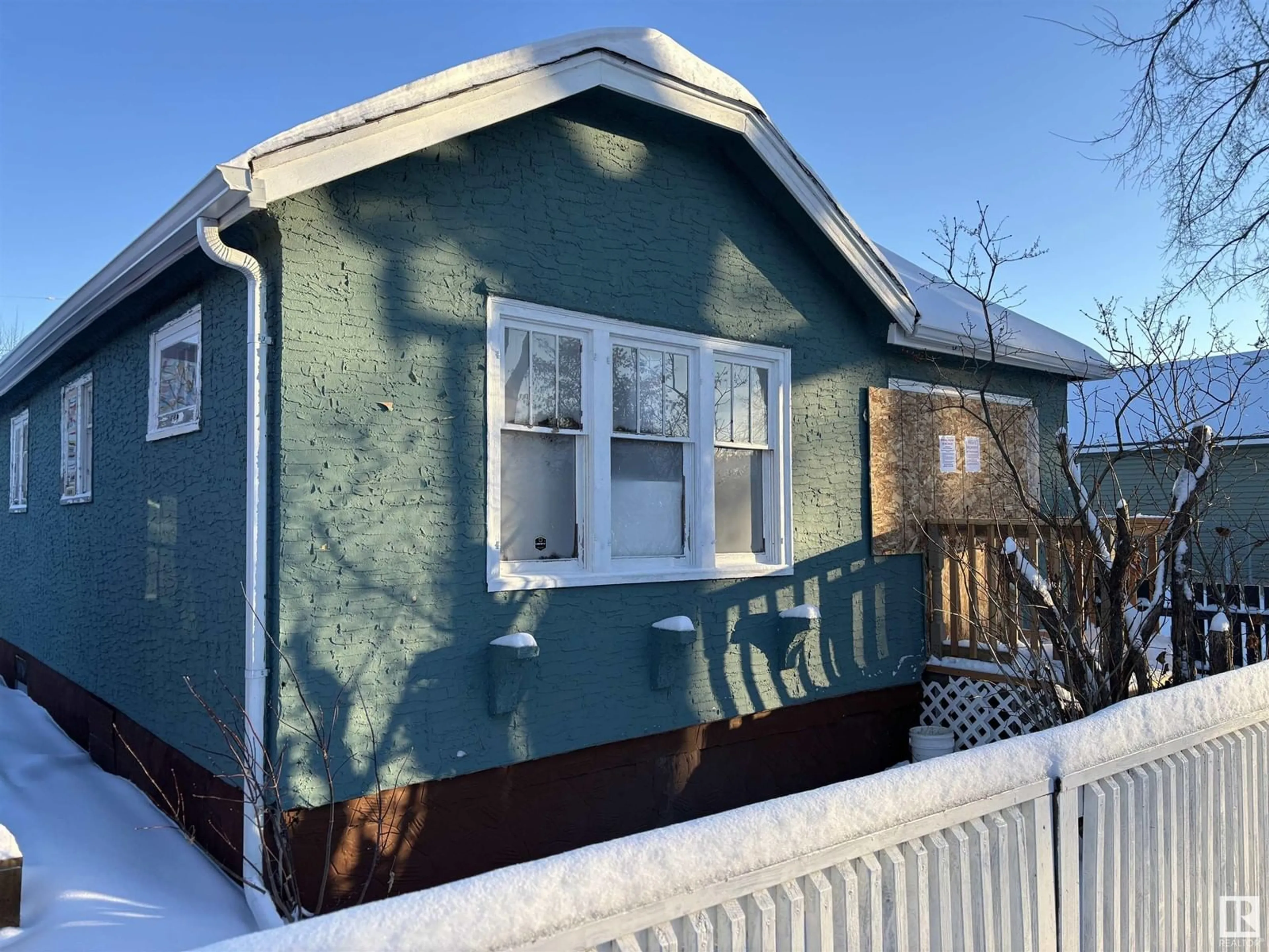 Home with vinyl exterior material, street for 11741 84 ST NW, Edmonton Alberta T5B3C2