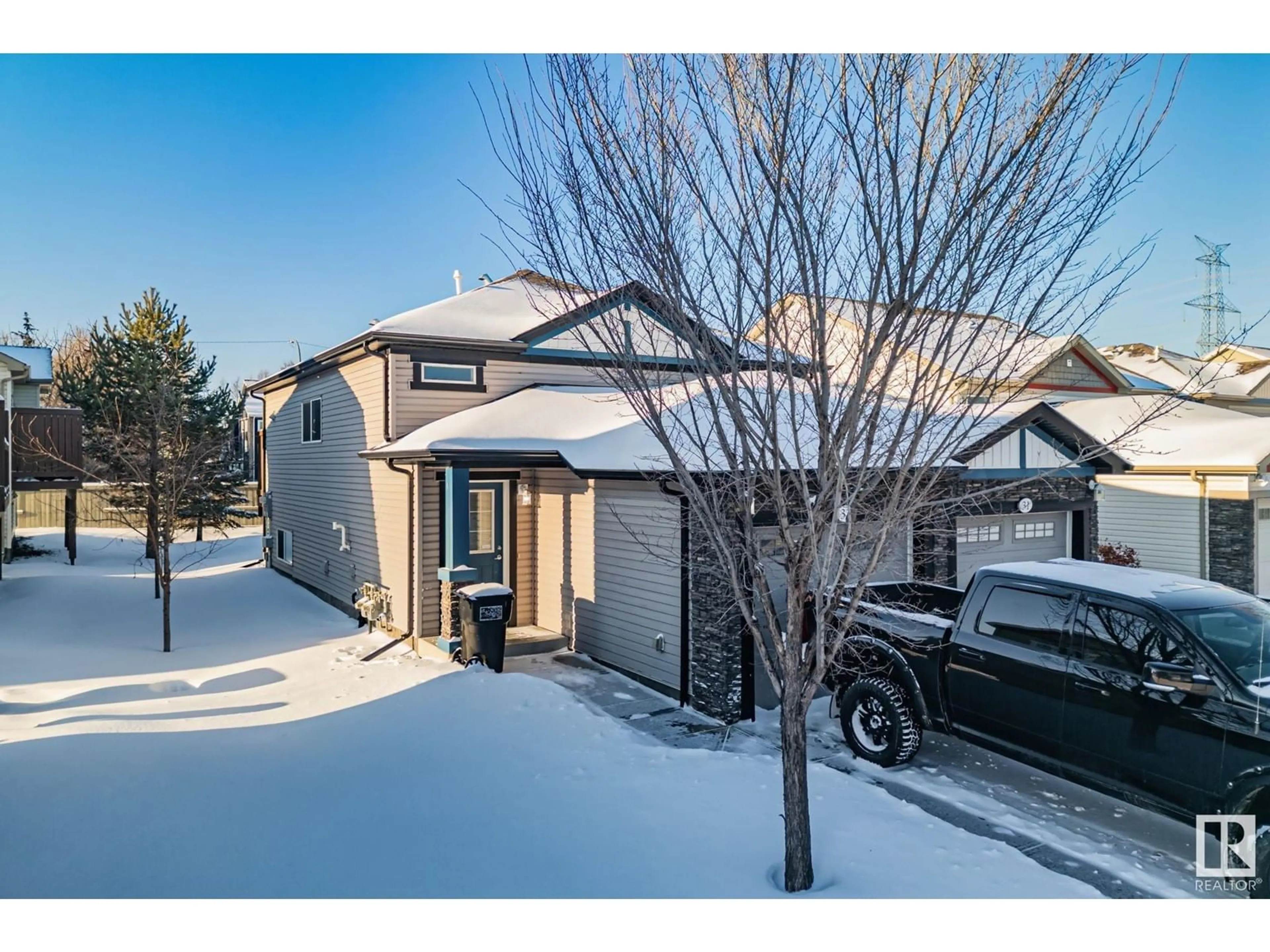 A pic from outside/outdoor area/front of a property/back of a property/a pic from drone, street for #32 6520 2 AV SW SW, Edmonton Alberta T6X0B5