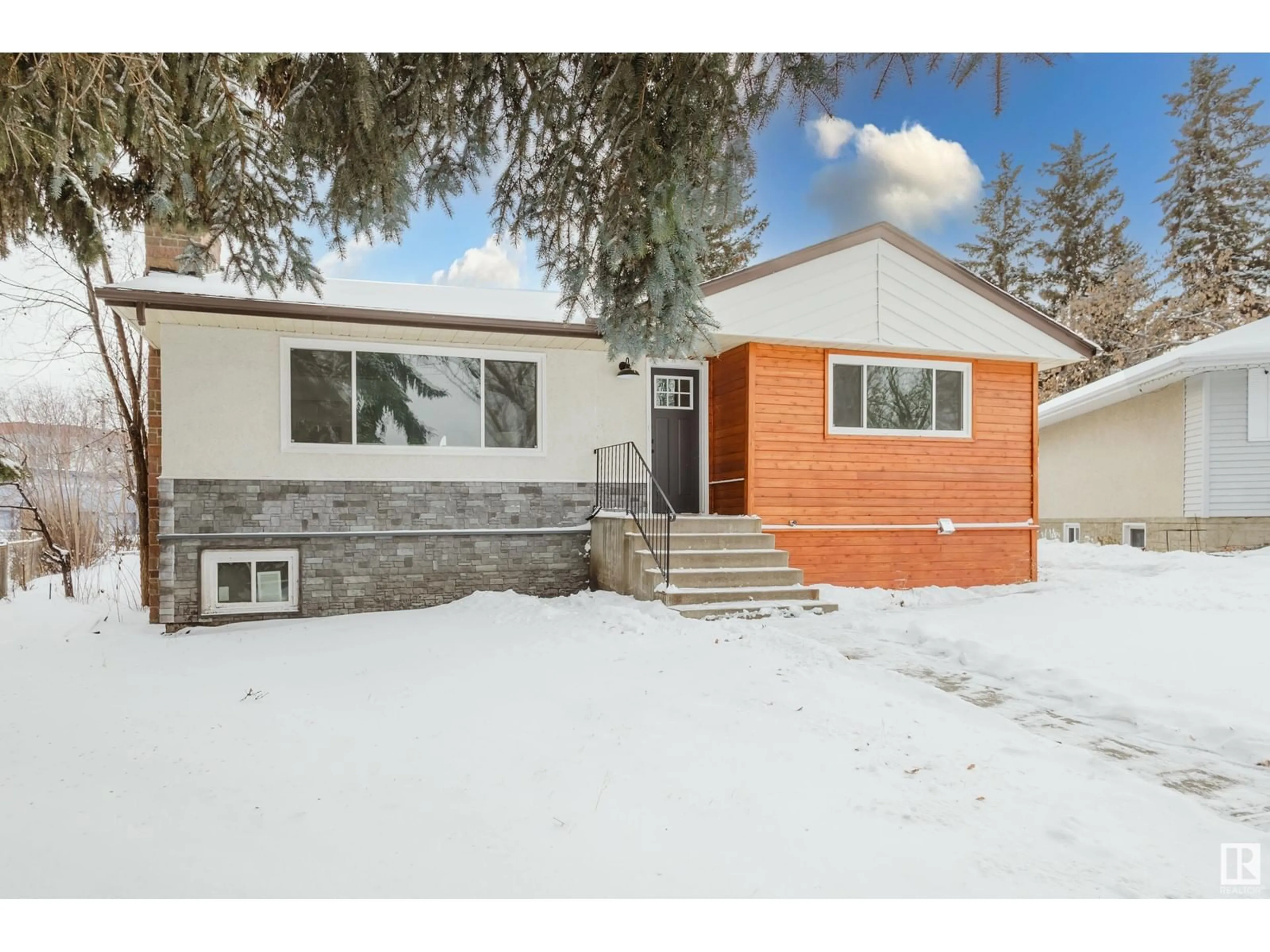 Home with vinyl exterior material, street for 10403 65 AV, Edmonton Alberta T6H1V2