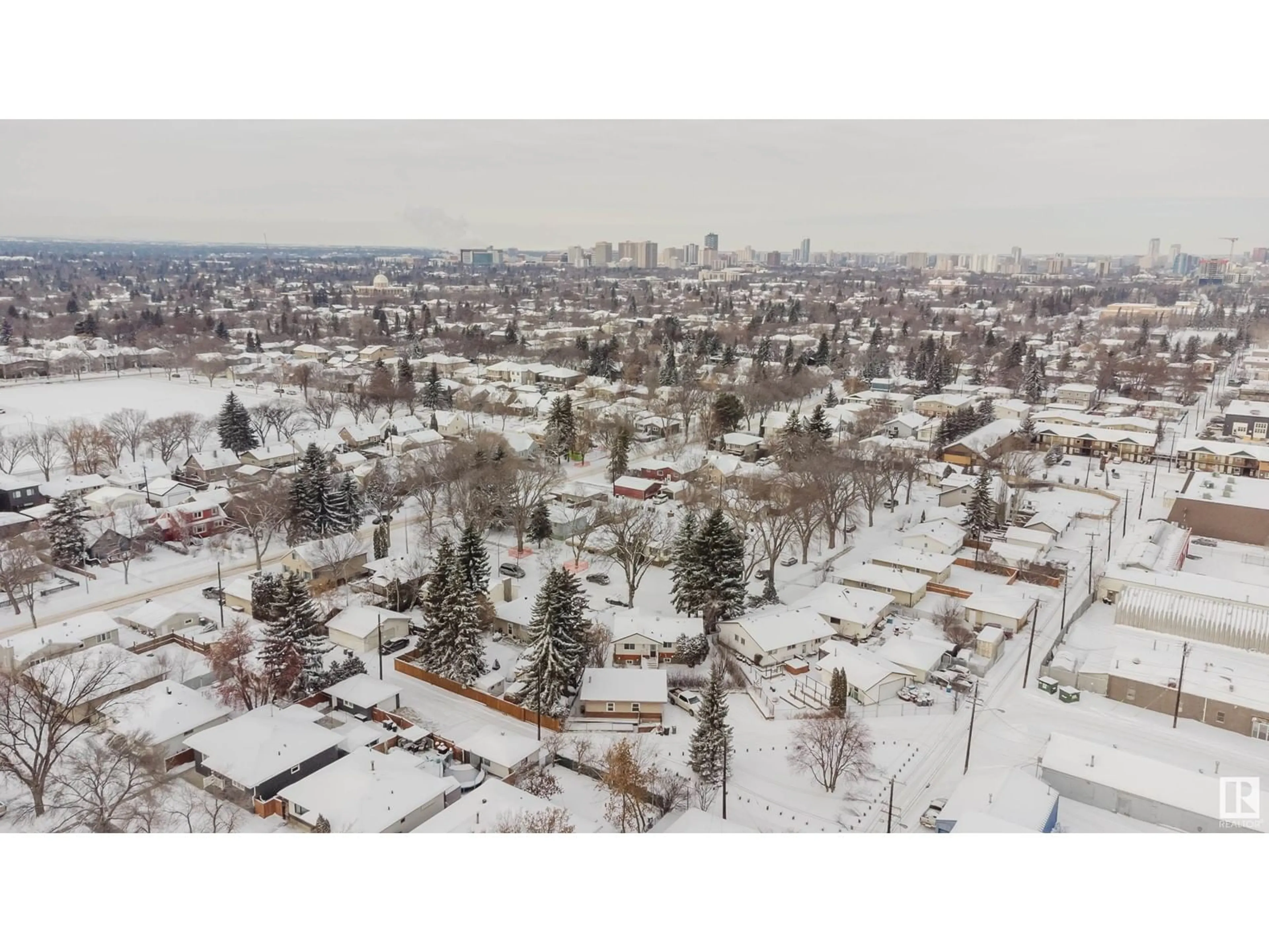 A pic from outside/outdoor area/front of a property/back of a property/a pic from drone, unknown for 10403 65 AV, Edmonton Alberta T6H1V2