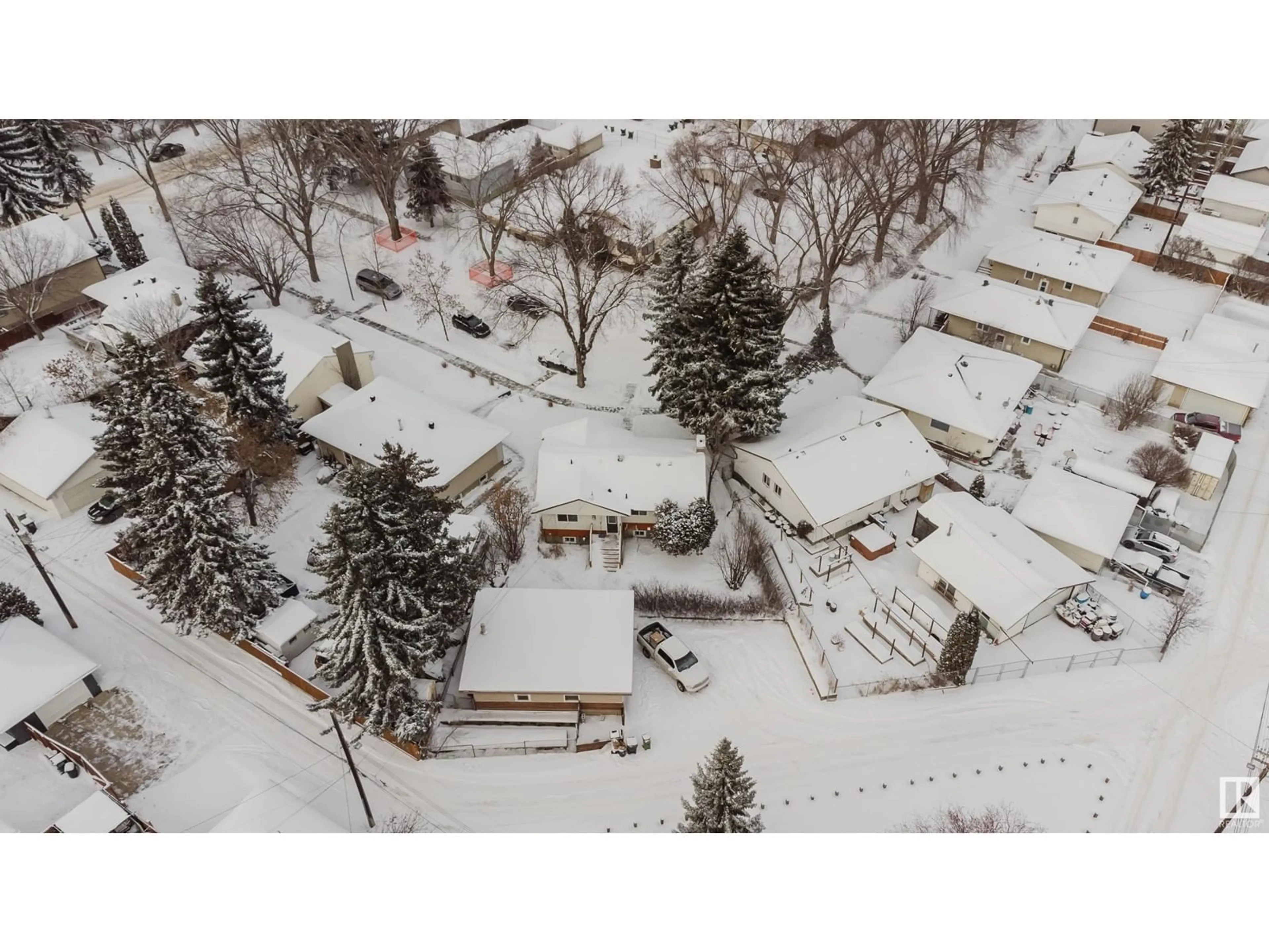 A pic from outside/outdoor area/front of a property/back of a property/a pic from drone, street for 10403 65 AV, Edmonton Alberta T6H1V2