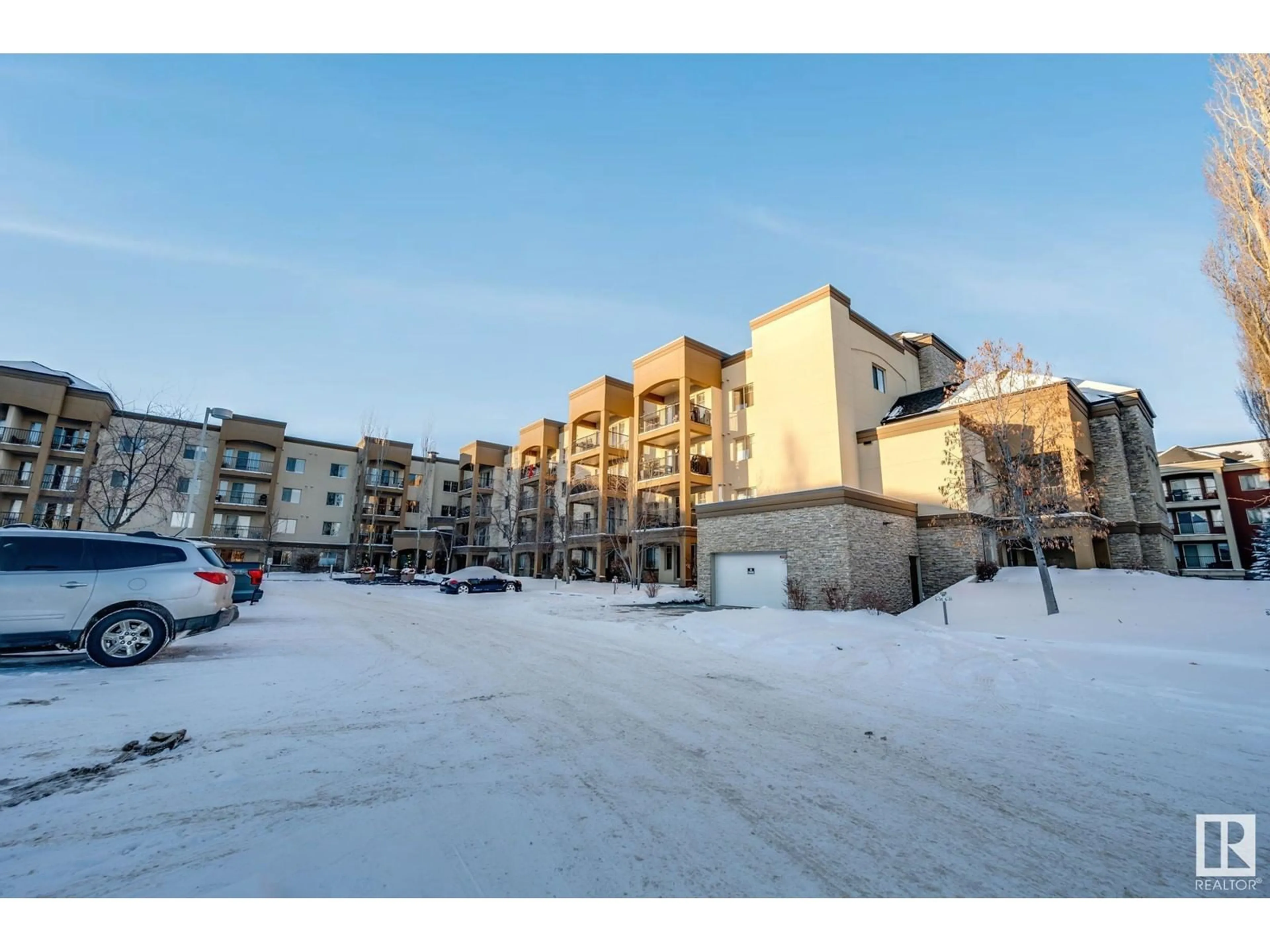 A pic from outside/outdoor area/front of a property/back of a property/a pic from drone, unknown for #402 400 PALISADES WY, Sherwood Park Alberta T8H0H4