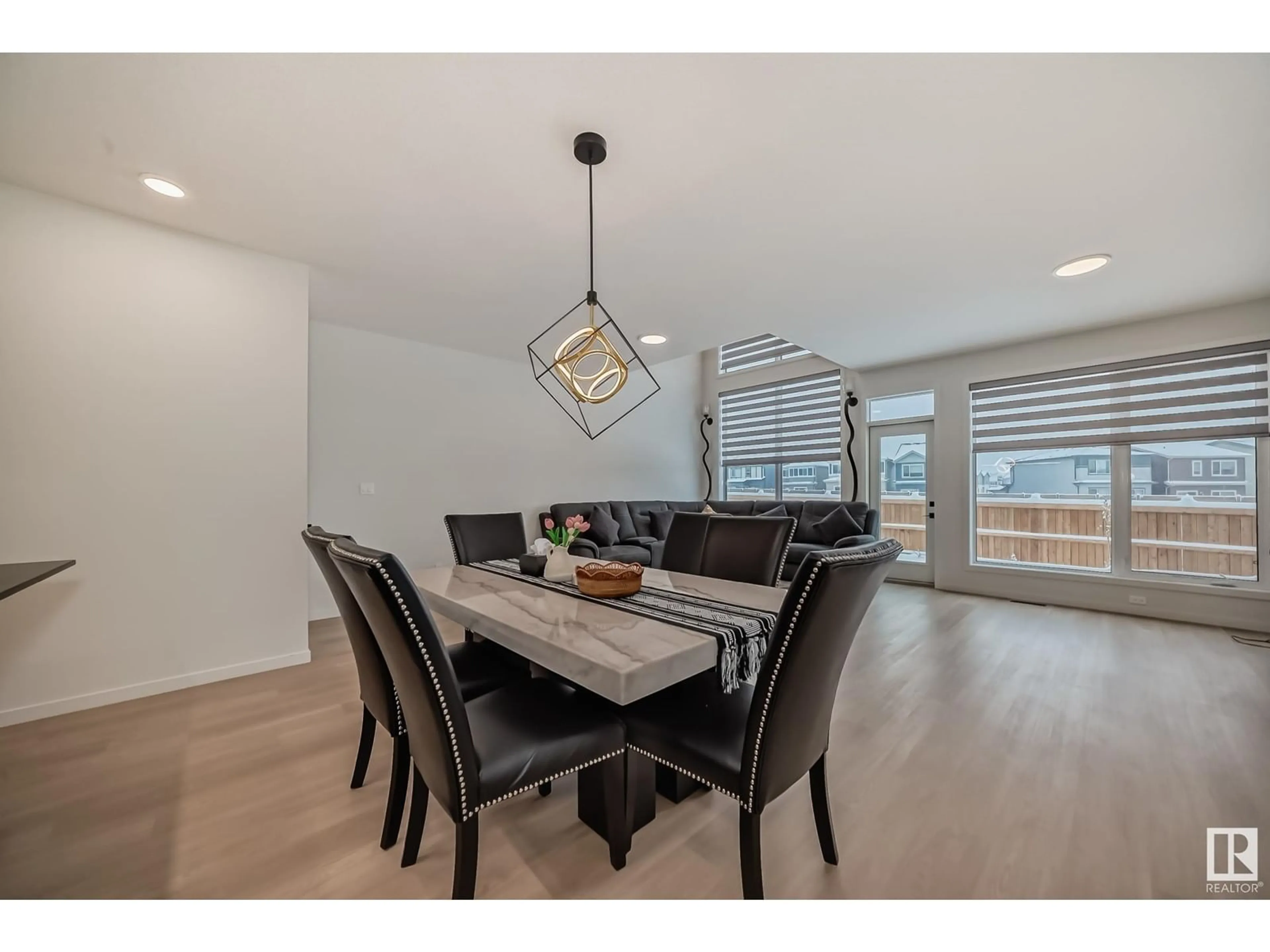 Dining room, wood/laminate floor for 412 33 Street SW SW, Edmonton Alberta T6X3C9