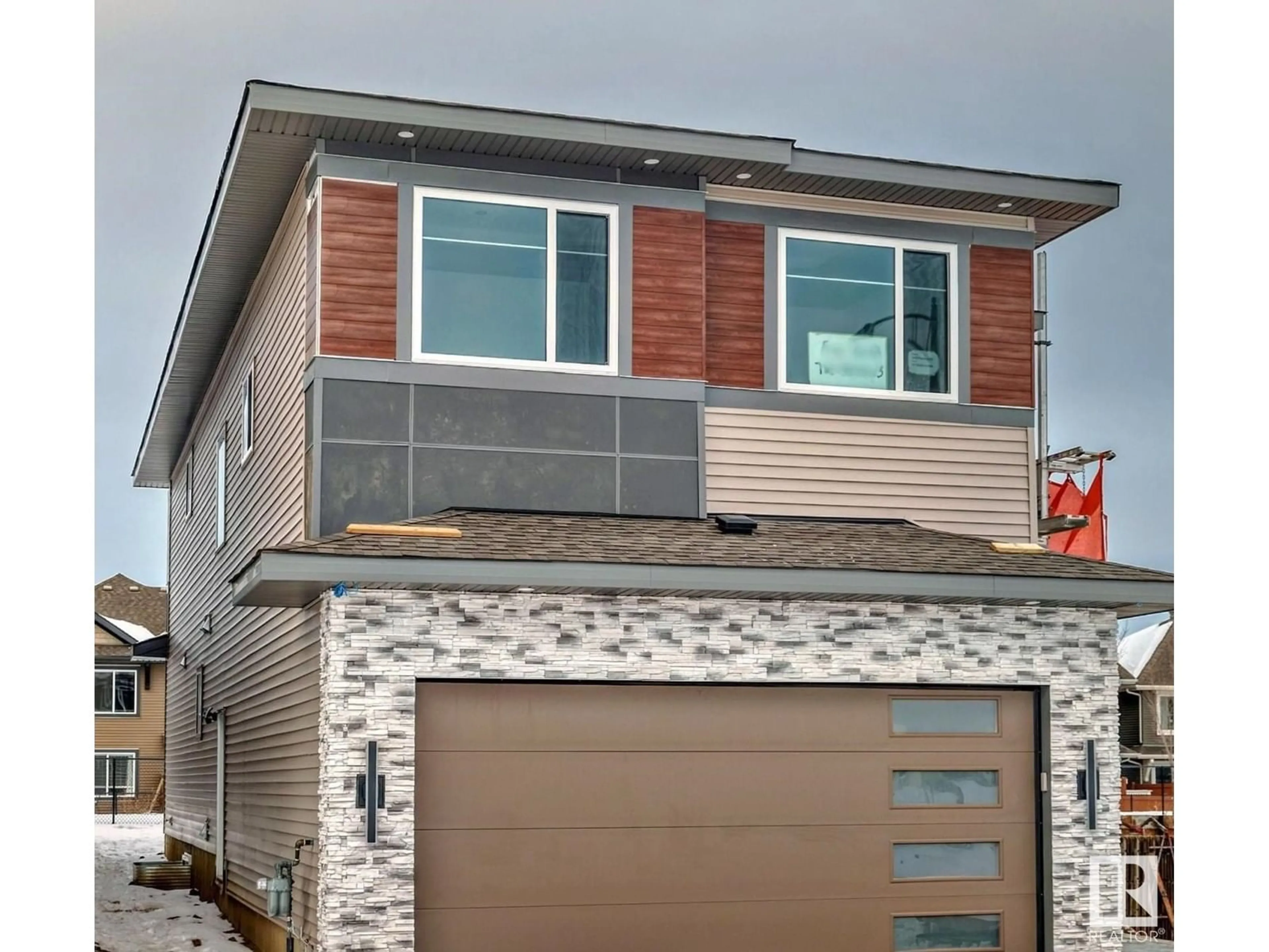 Home with vinyl exterior material, street for 8429 MAYDAY LINK LI SW, Edmonton Alberta T6X3G1