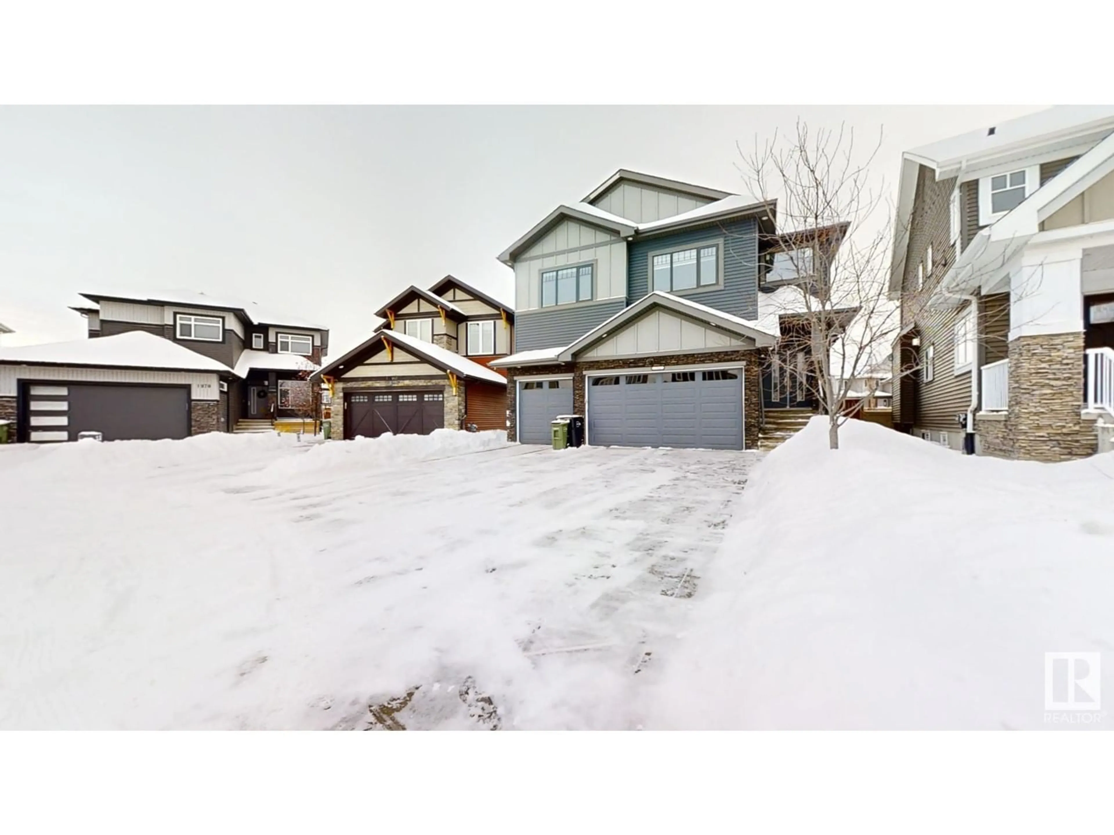 A pic from outside/outdoor area/front of a property/back of a property/a pic from drone, street for 1966 Adamson TC SW SW, Edmonton Alberta T6W1A8