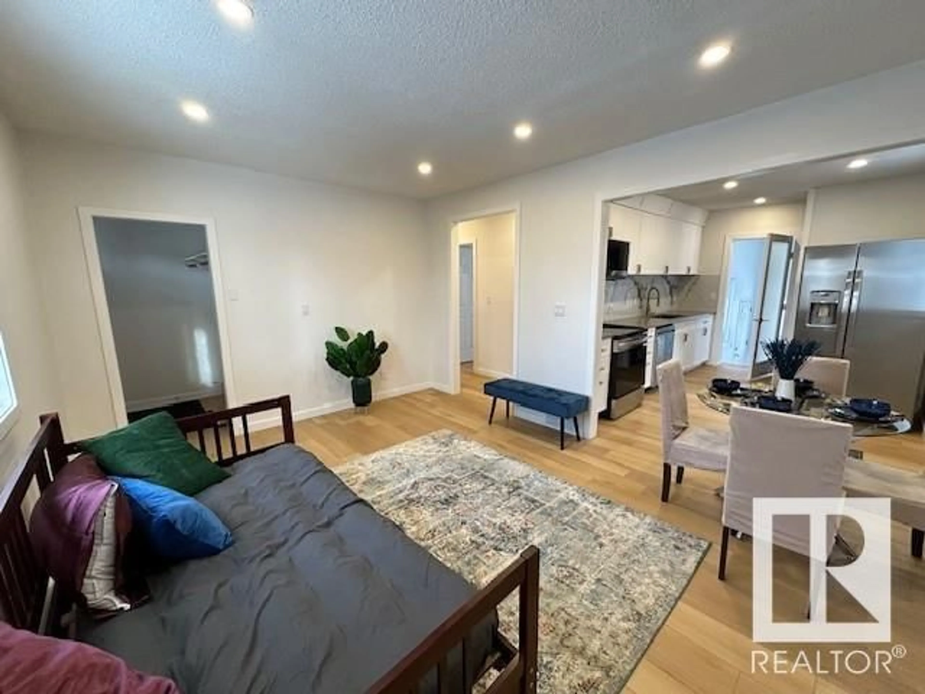 Living room with furniture, unknown for 12043 63 ST NW, Edmonton Alberta T5W4G5