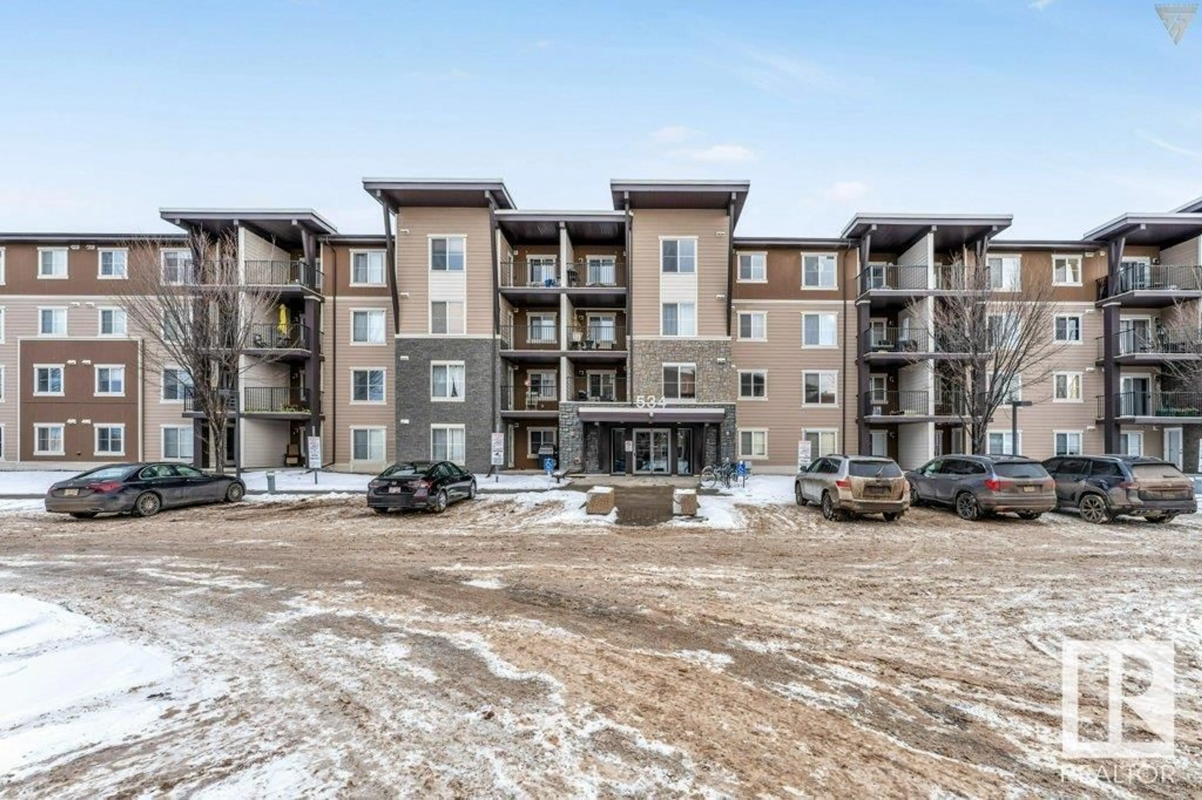 A pic from outside/outdoor area/front of a property/back of a property/a pic from drone, building for #203 534 WATT BV SW, Edmonton Alberta T6X1P7