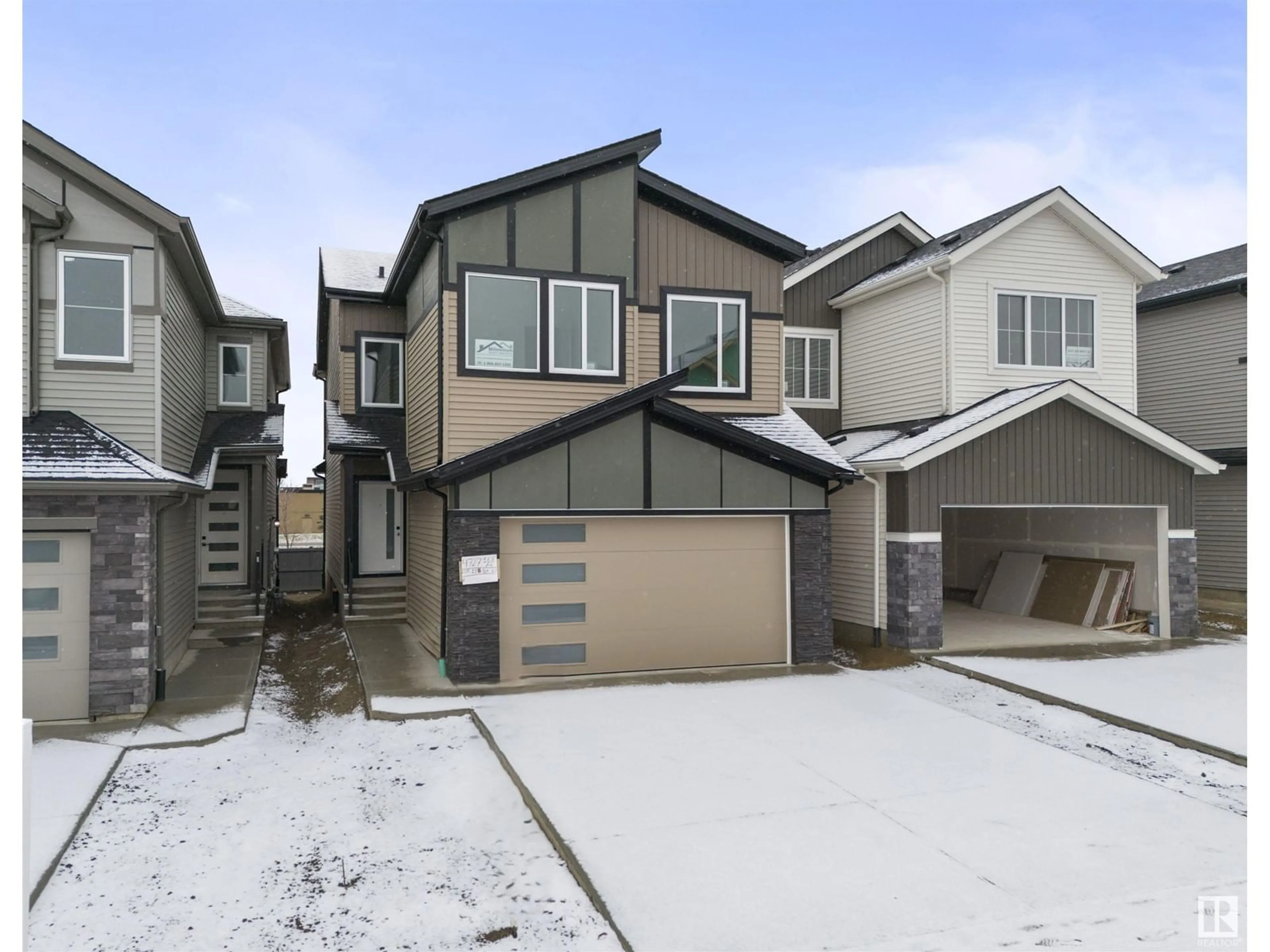 Home with vinyl exterior material, street for 4731 168 AVE NW NW, Edmonton Alberta T5Y0W3