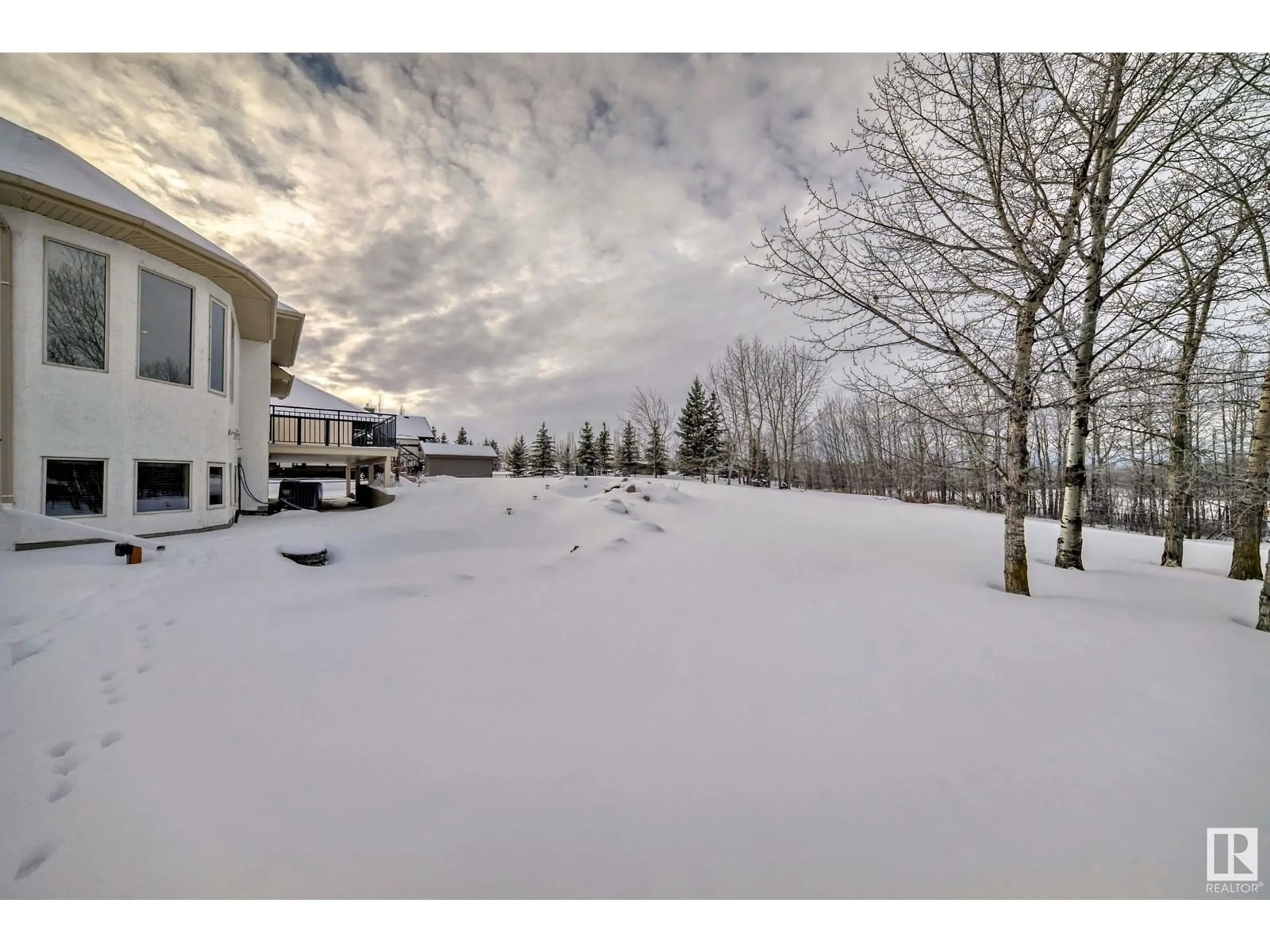 A pic from outside/outdoor area/front of a property/back of a property/a pic from drone, unknown for #28 26323 TWP ROAD 532 A, Rural Parkland County Alberta T7X4M1