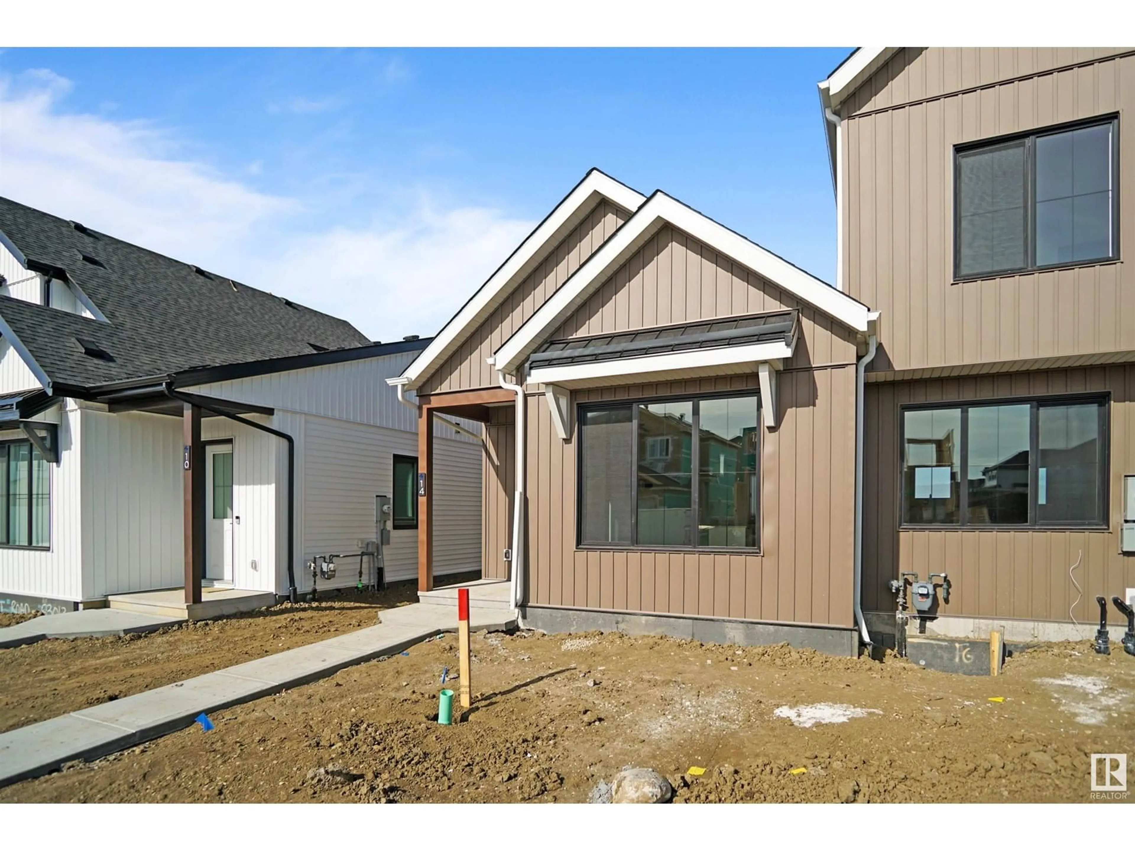 Home with vinyl exterior material, street for 20505 42 AV NW, Edmonton Alberta T6M0R8