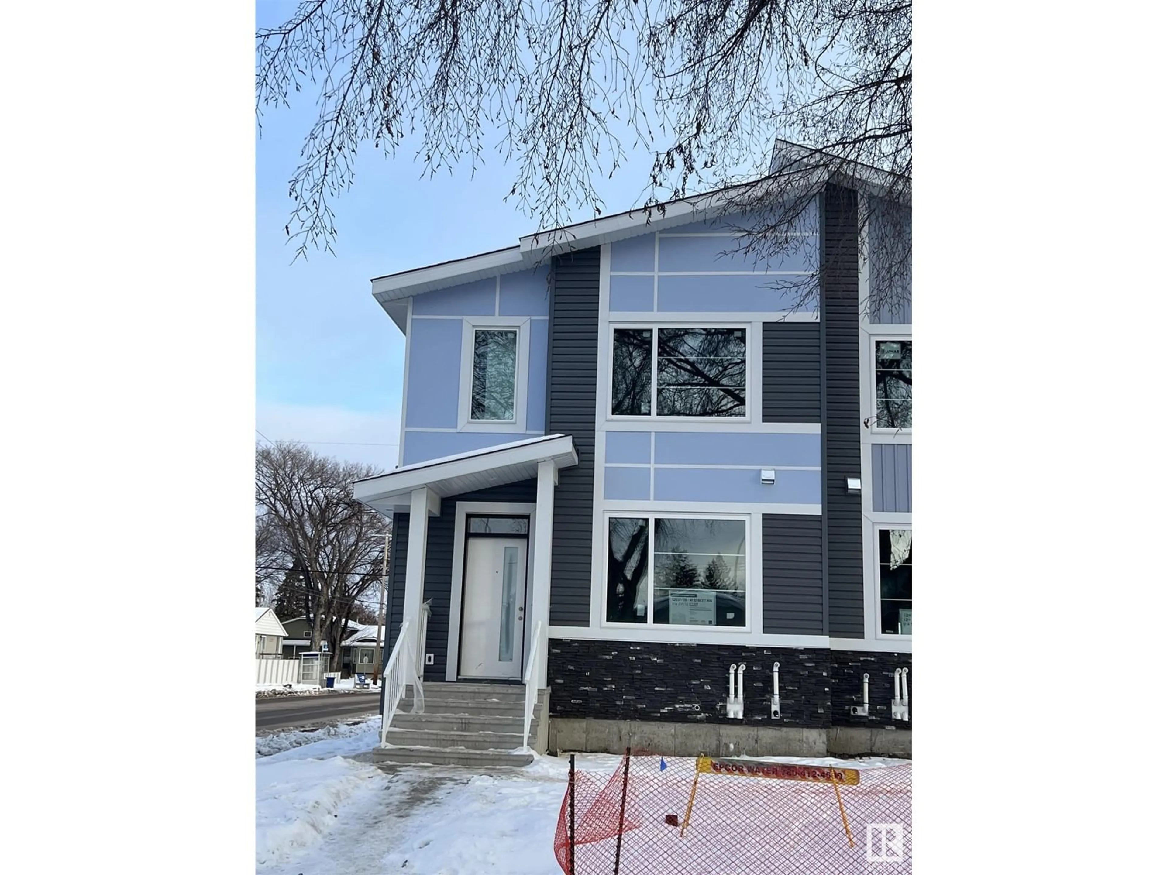 Home with vinyl exterior material, street for 12039 41 ST NW, Edmonton Alberta T5W2M3