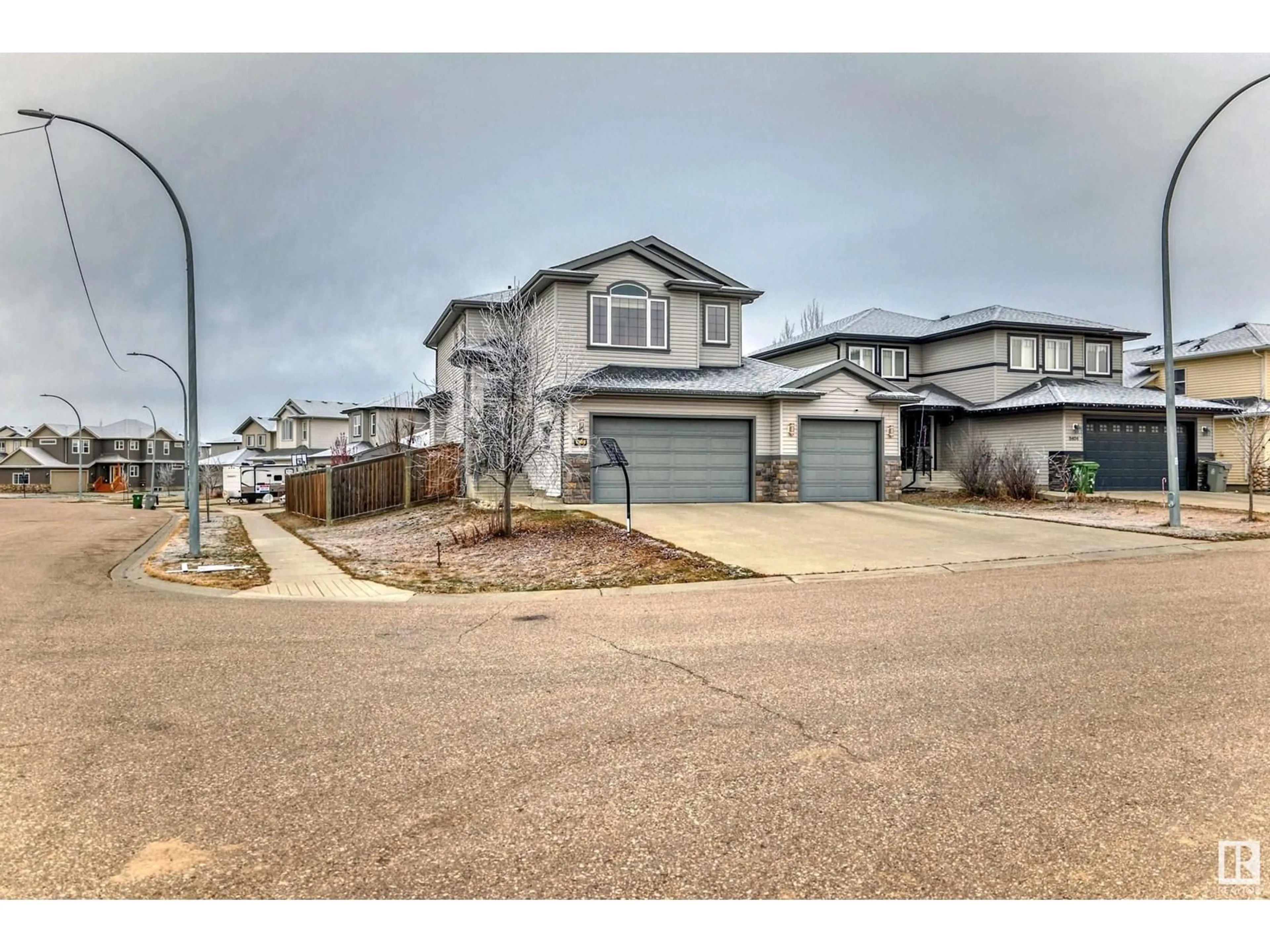 A pic from outside/outdoor area/front of a property/back of a property/a pic from drone, street for 8402 94 ST, Morinville Alberta T8R0A7