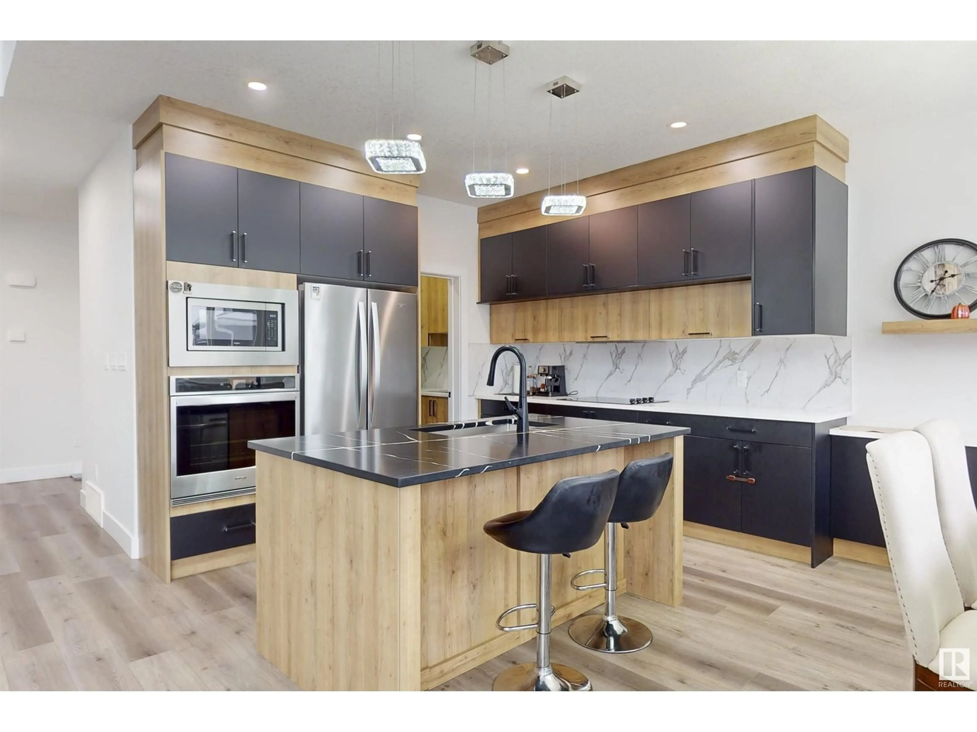 Contemporary kitchen, wood/laminate floor for 5816 Peltier Close, Beaumont Alberta T4X2Y1