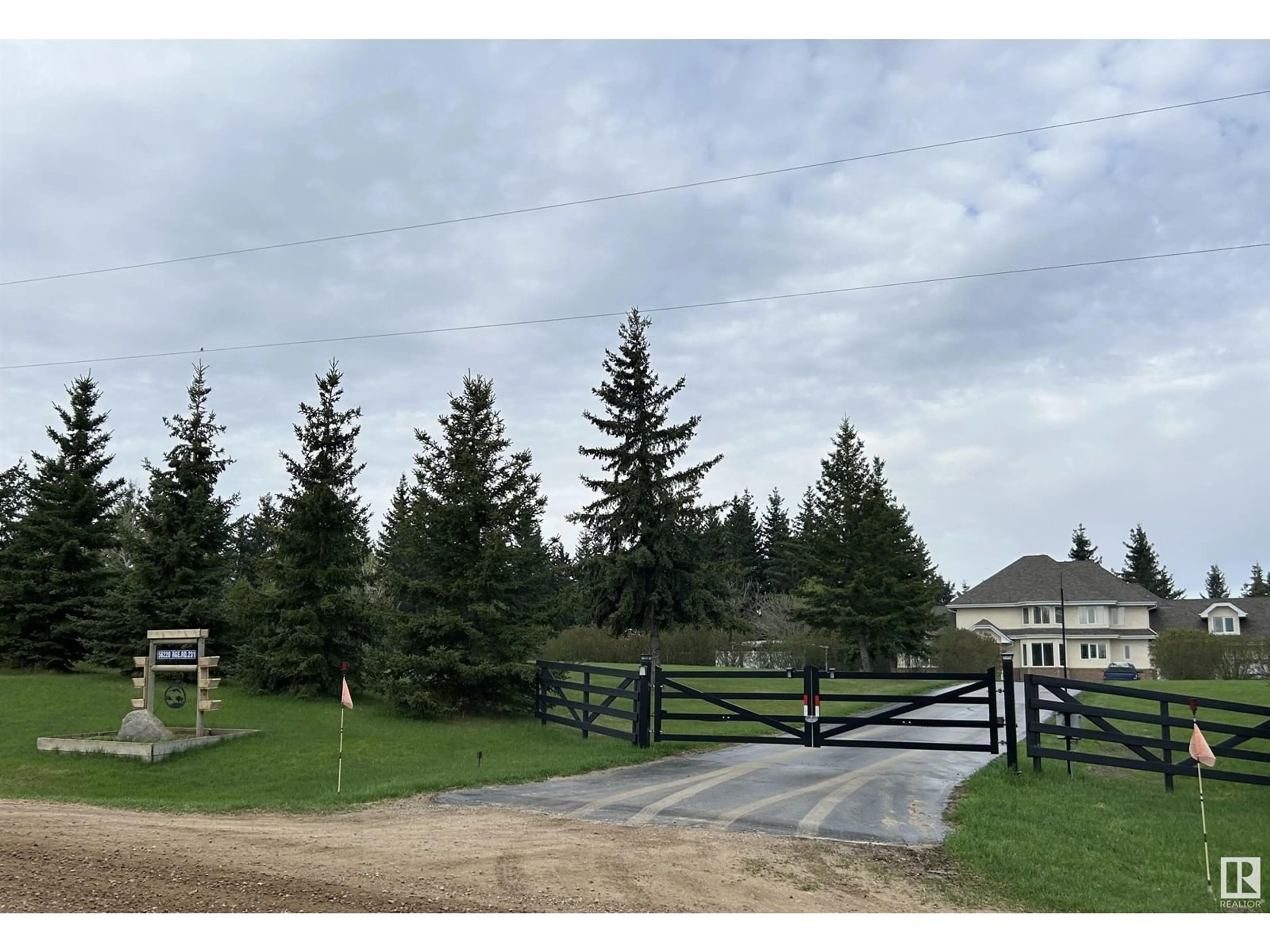 A pic from outside/outdoor area/front of a property/back of a property/a pic from drone, mountain view for 56220 Rge Rd 231, Rural Sturgeon County Alberta T0A1N4