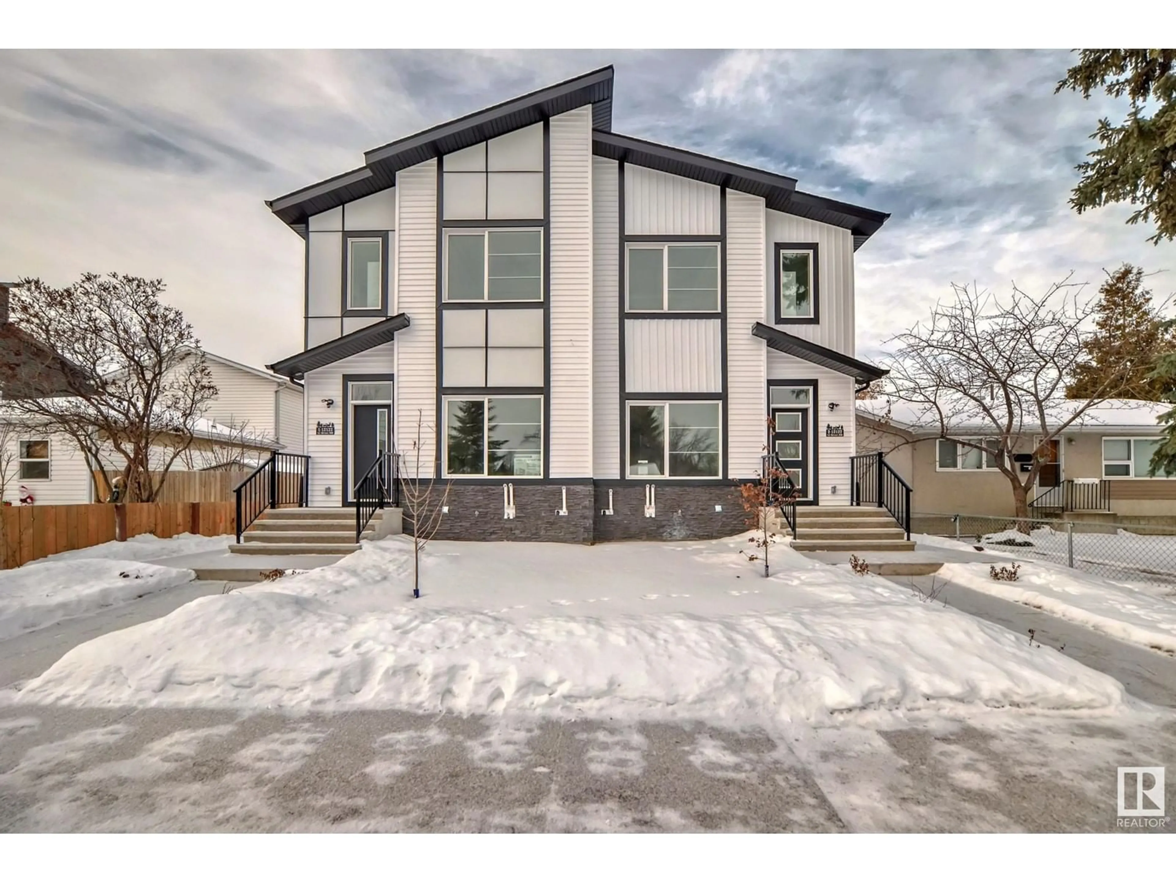 Home with brick exterior material, street for 2 12122 43 ST NW, Edmonton Alberta T5W2R1