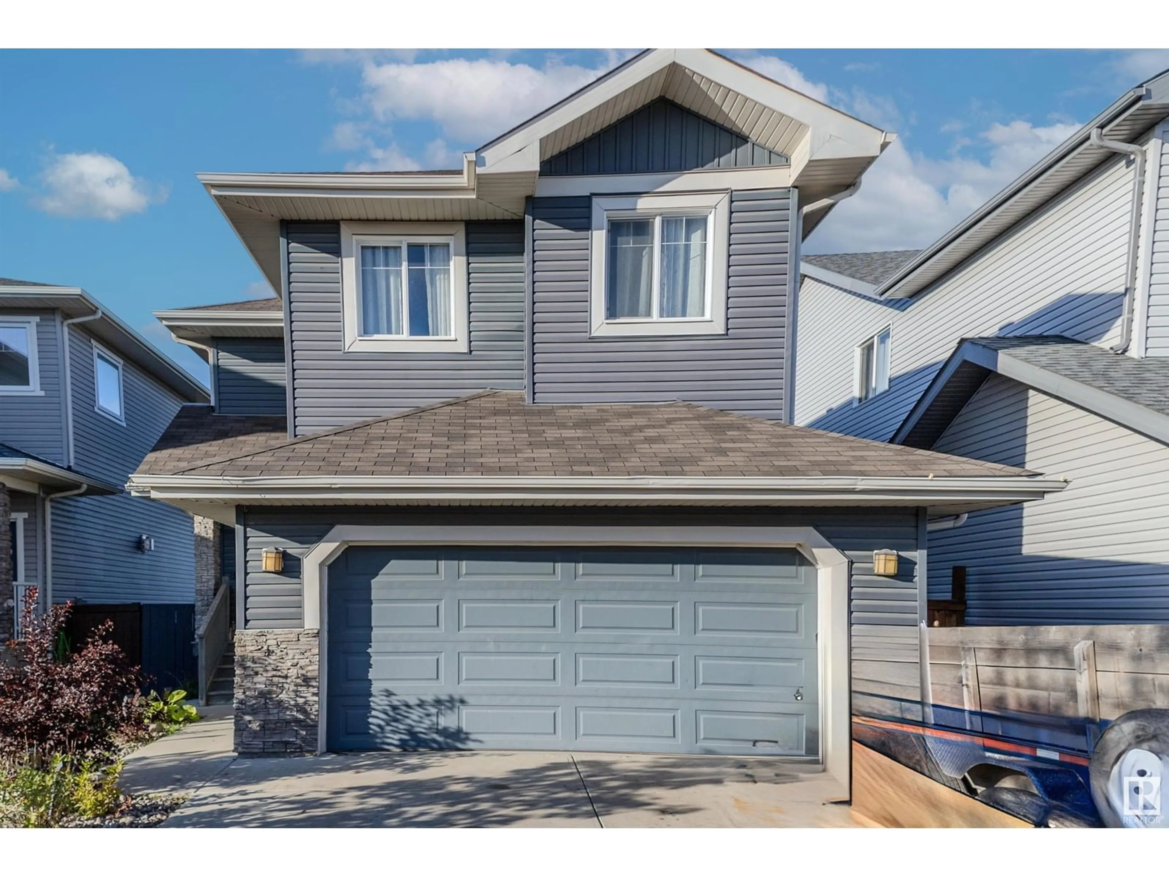 Home with vinyl exterior material, street for 76 DALQUIST BA, Leduc Alberta T9E0J7