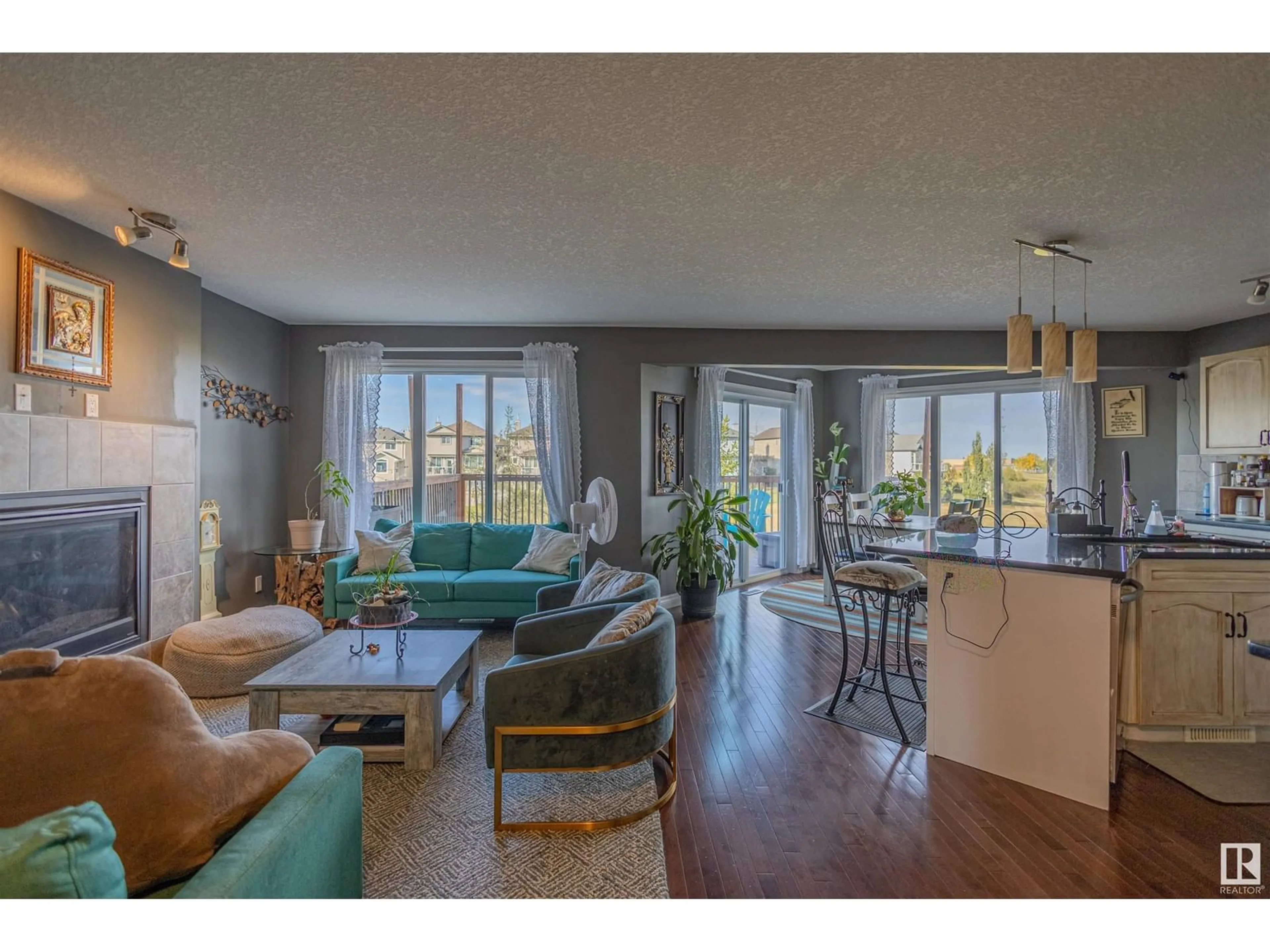 Living room with furniture, wood/laminate floor for 76 DALQUIST BA, Leduc Alberta T9E0J7