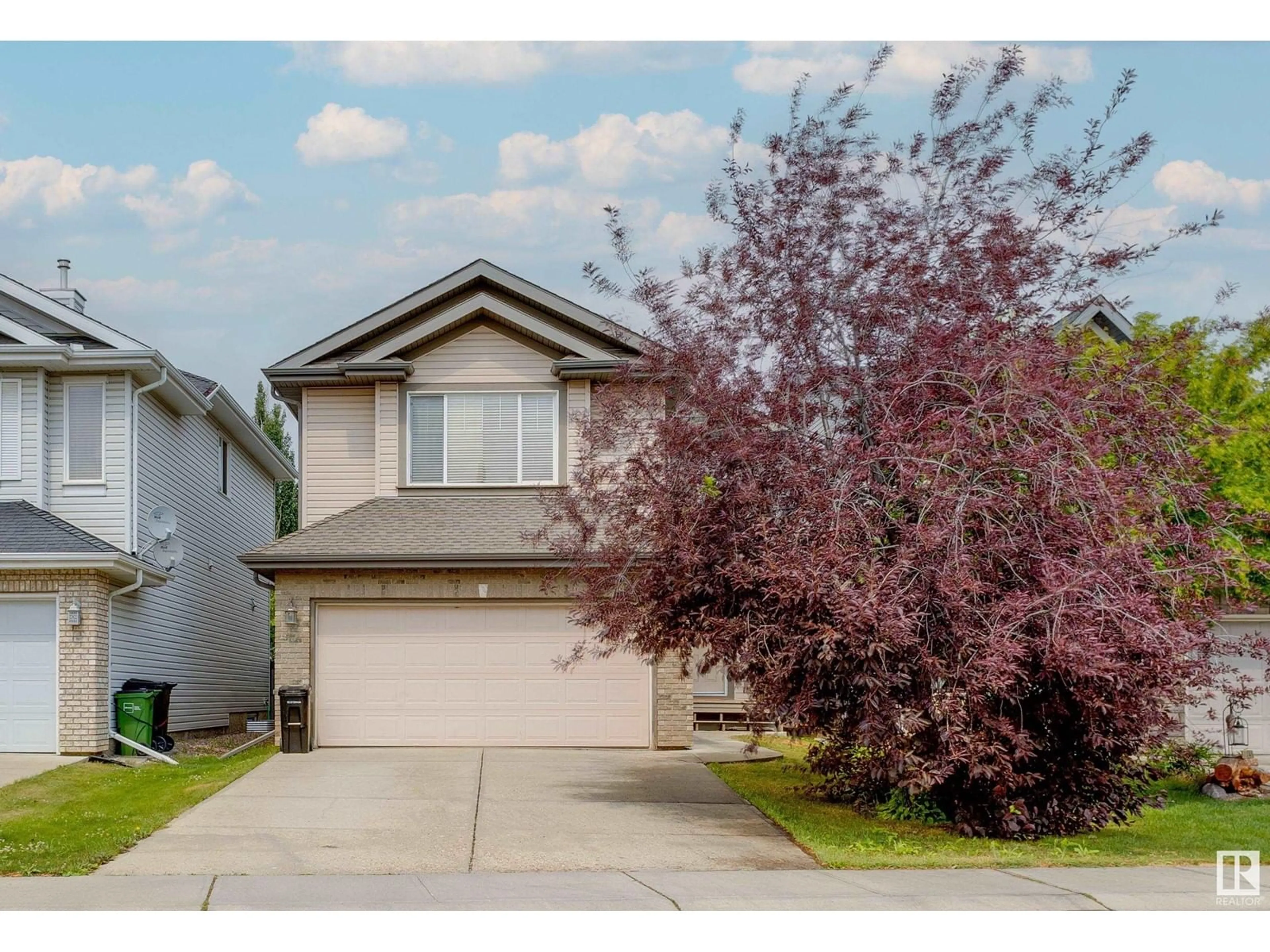 Home with vinyl exterior material, street for 1050 MCKINNEY GR NW, Edmonton Alberta T6R3S4