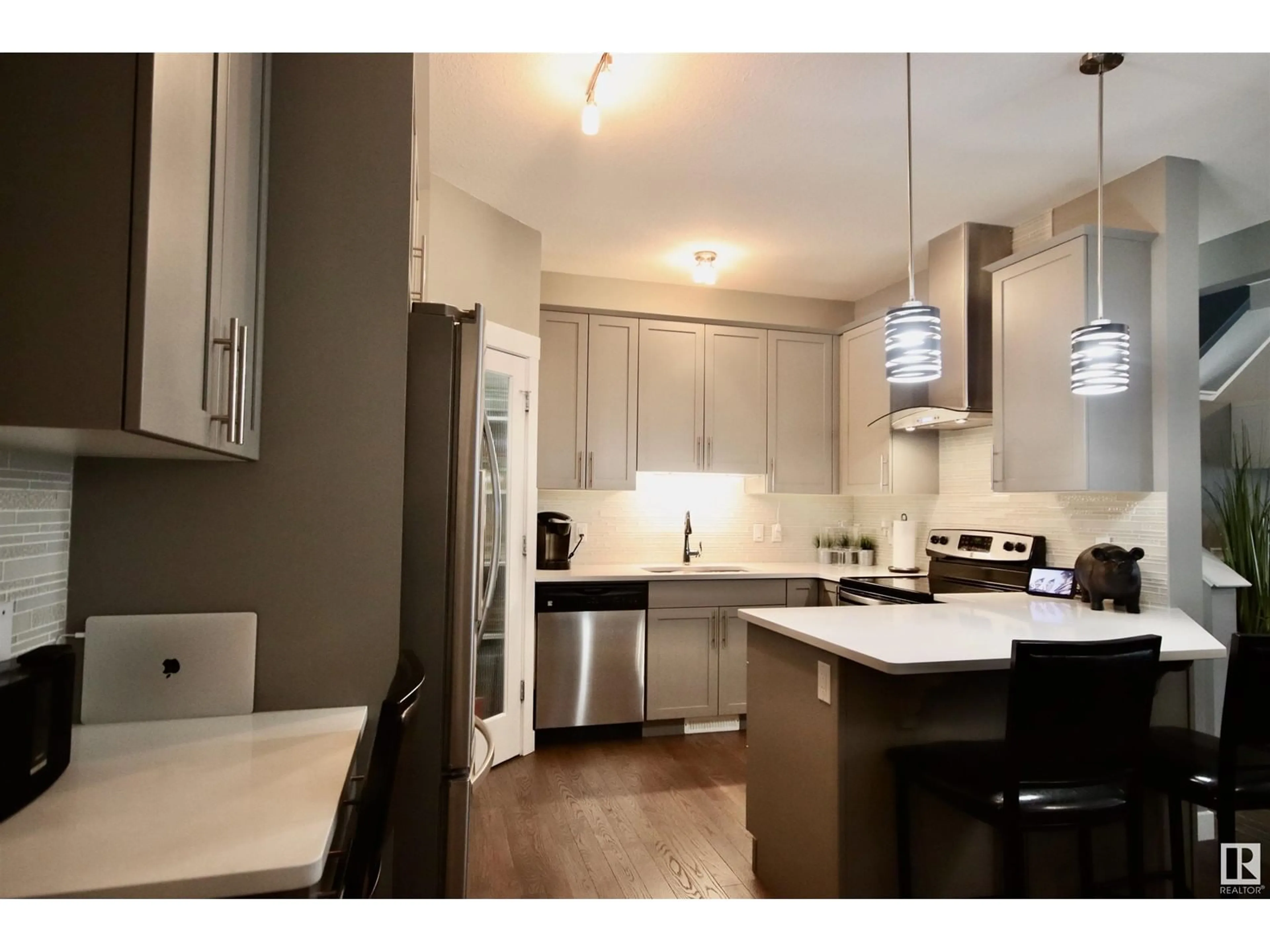 Open concept kitchen, unknown for 20728 99 AV NW, Edmonton Alberta T5T7G3