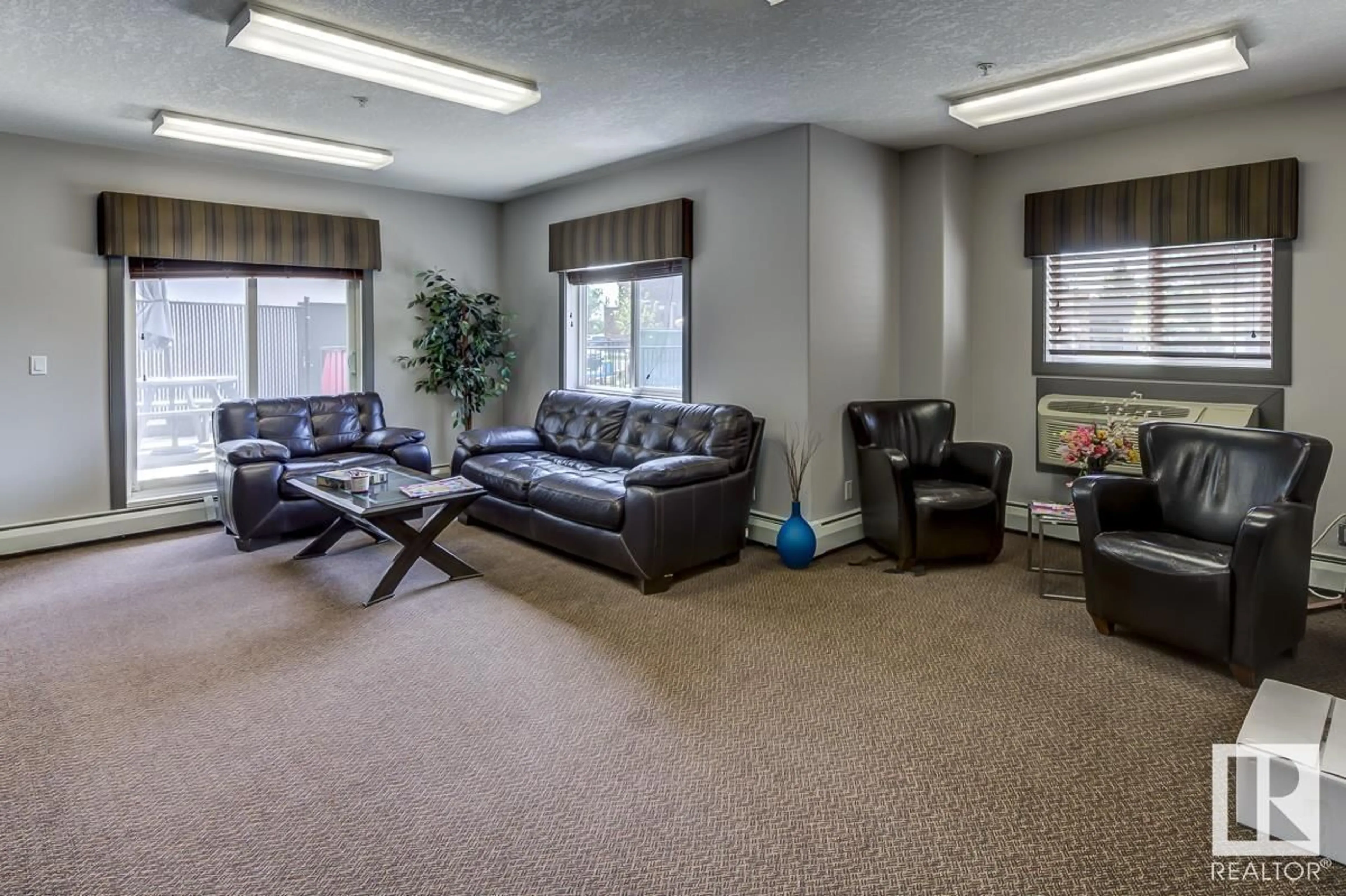 Living room with furniture, carpet floor for #109 4415 48 ST, Leduc Alberta T9E5Y3