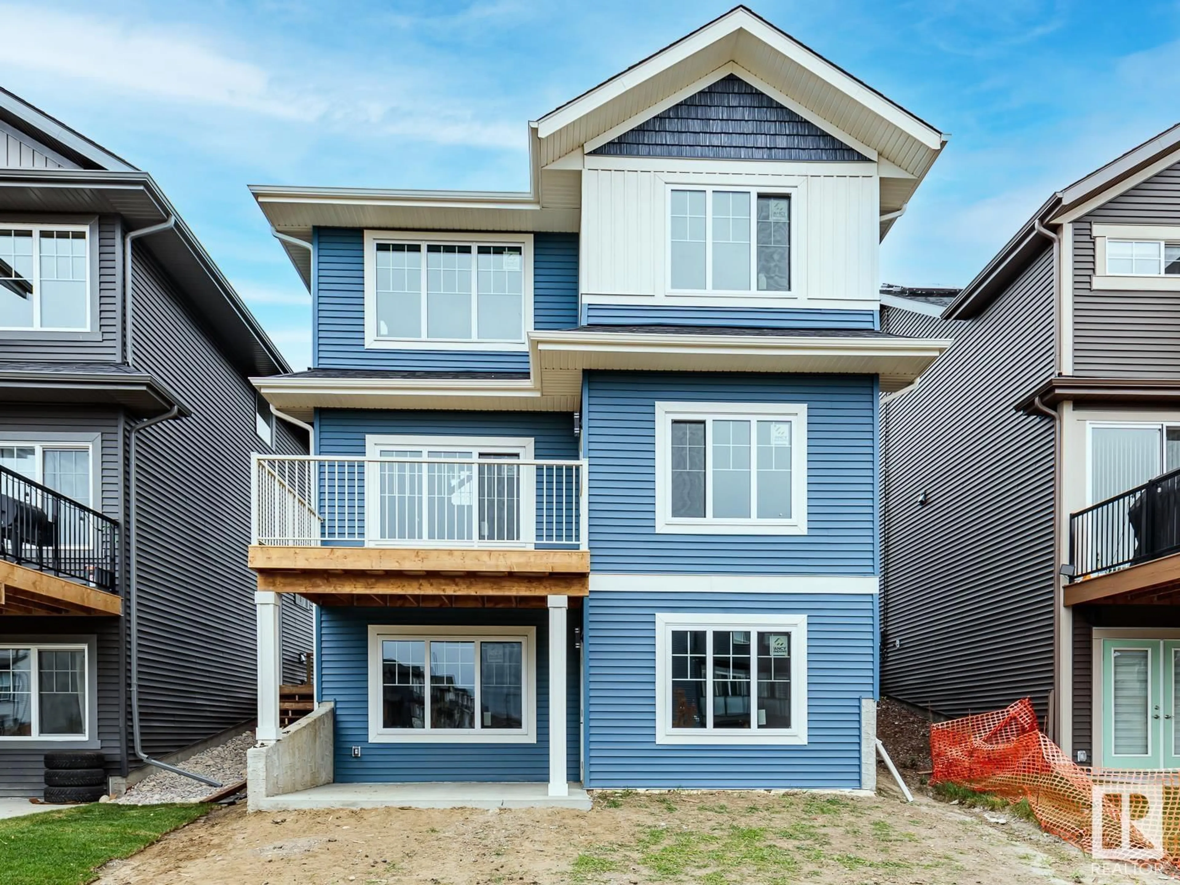 Home with vinyl exterior material, street for 516 MERLIN LANDING LD NW, Edmonton Alberta T5S0L9