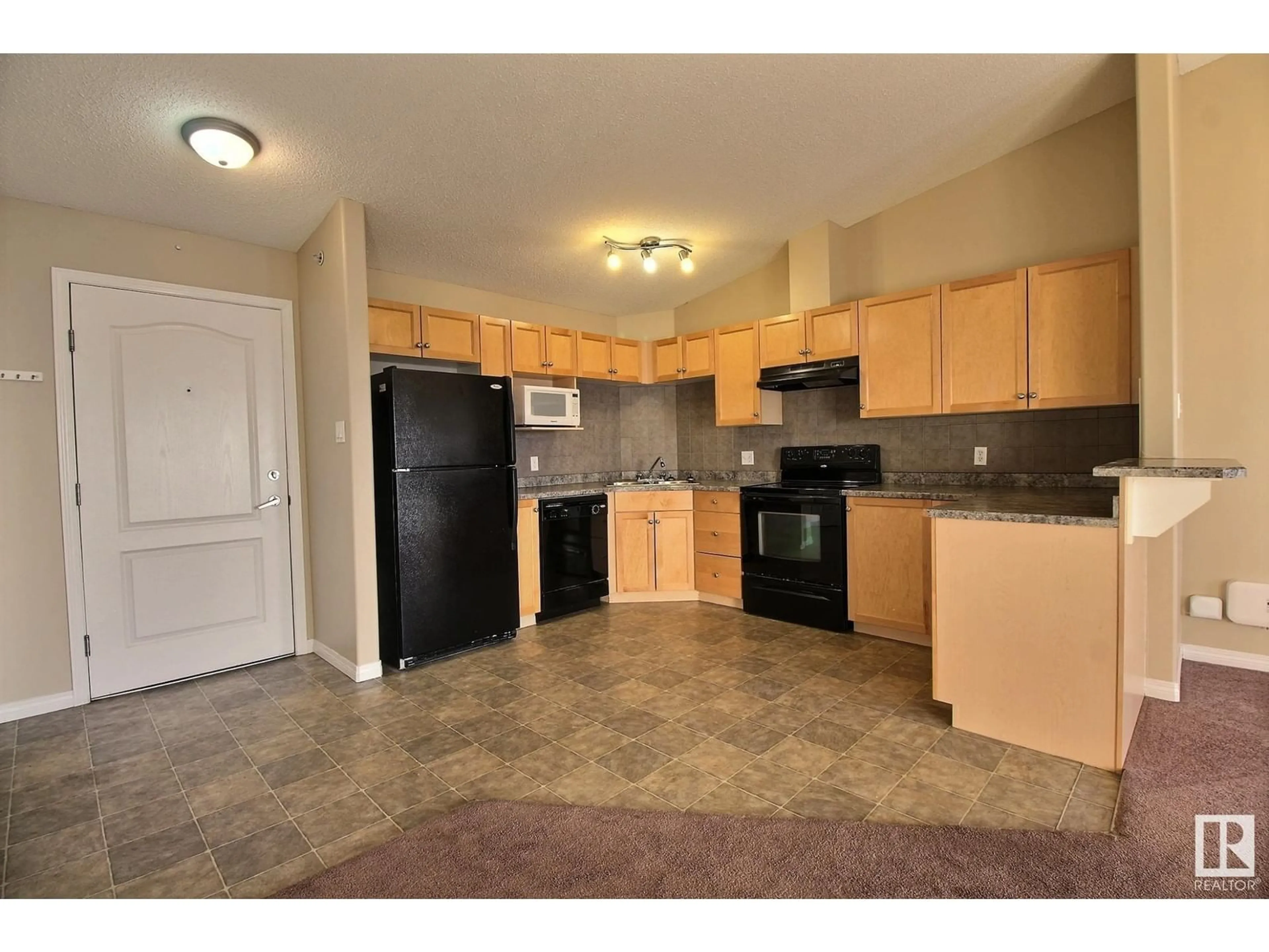 Standard kitchen, unknown for #410 111 EDWARDS DR SW, Edmonton Alberta T6X0C4