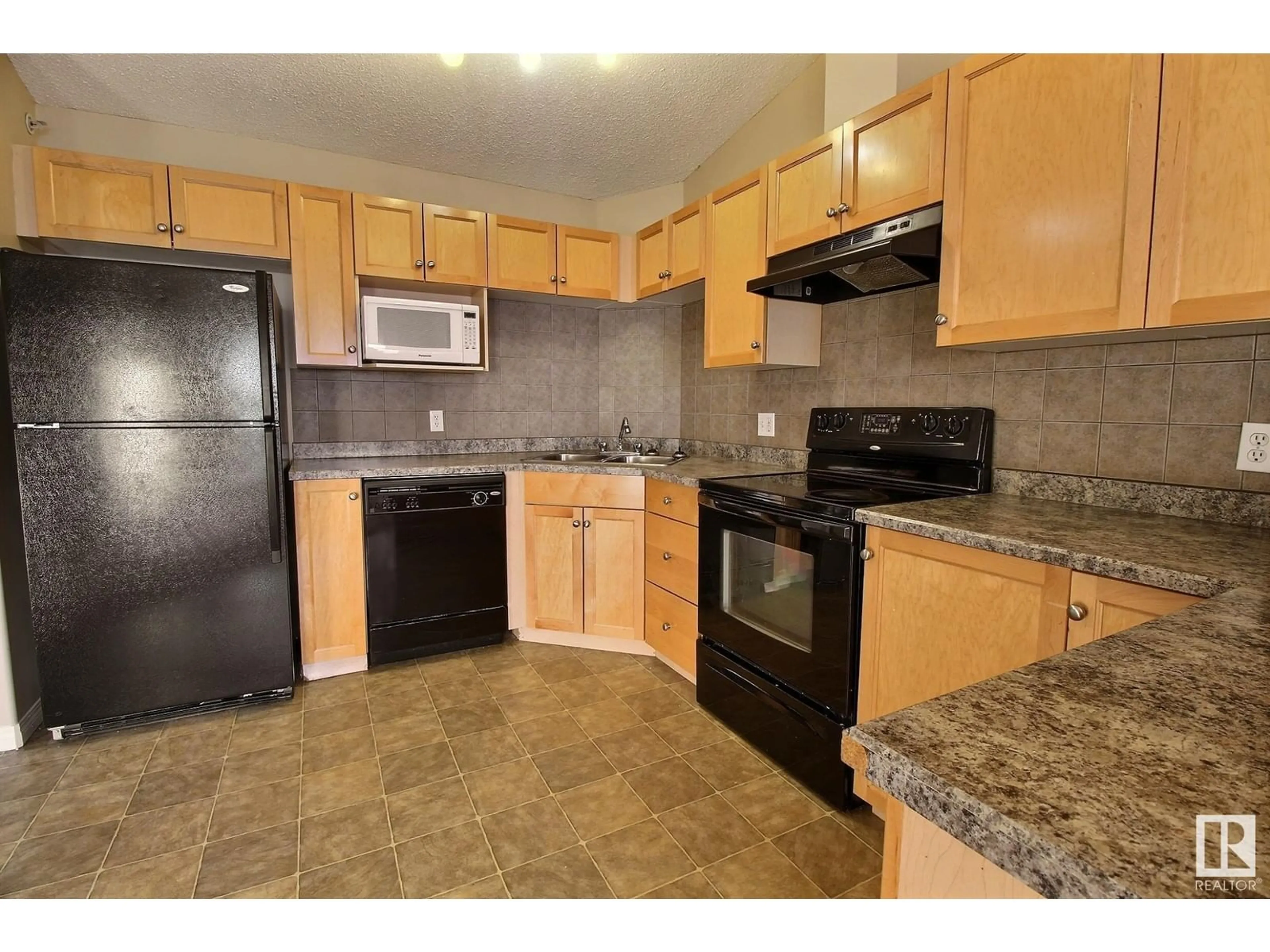 Standard kitchen, unknown for #410 111 EDWARDS DR SW, Edmonton Alberta T6X0C4