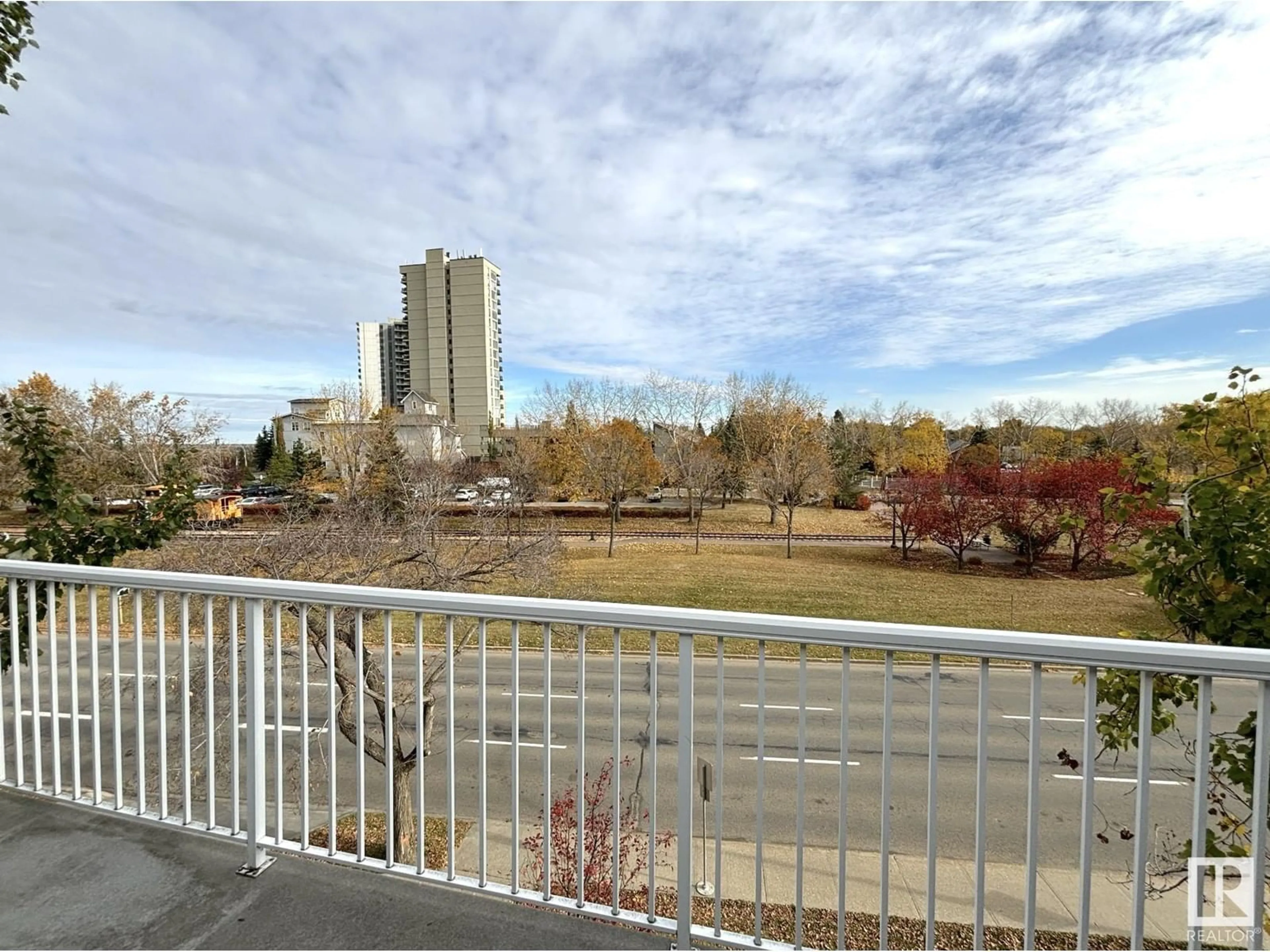 Balcony in the apartment, city buildings view from balcony for #402 8604 GATEWAY BV NW, Edmonton Alberta T6E4B6