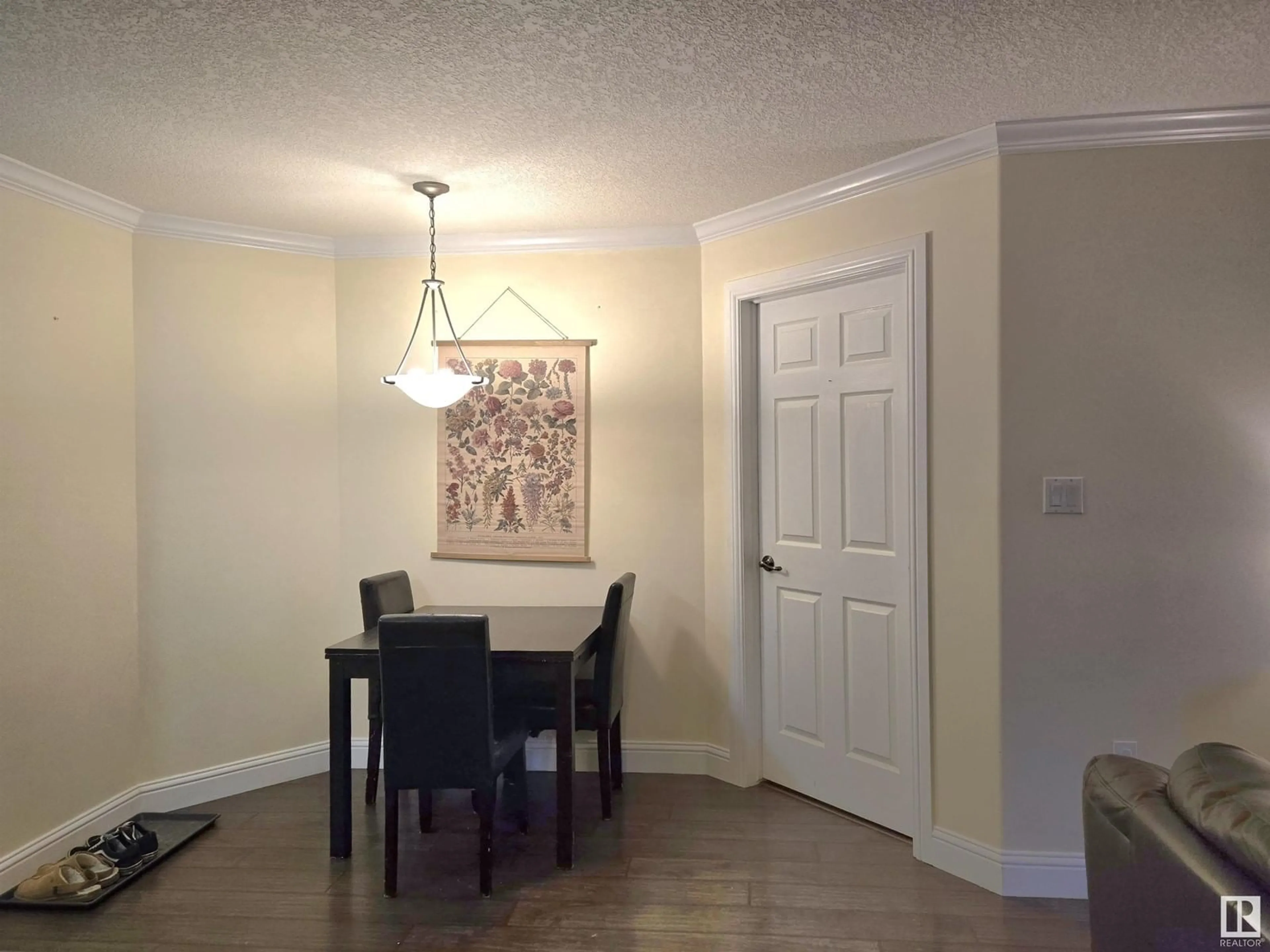 Dining room, wood/laminate floor for #113 13111 140 AV NW, Edmonton Alberta T6V0B1