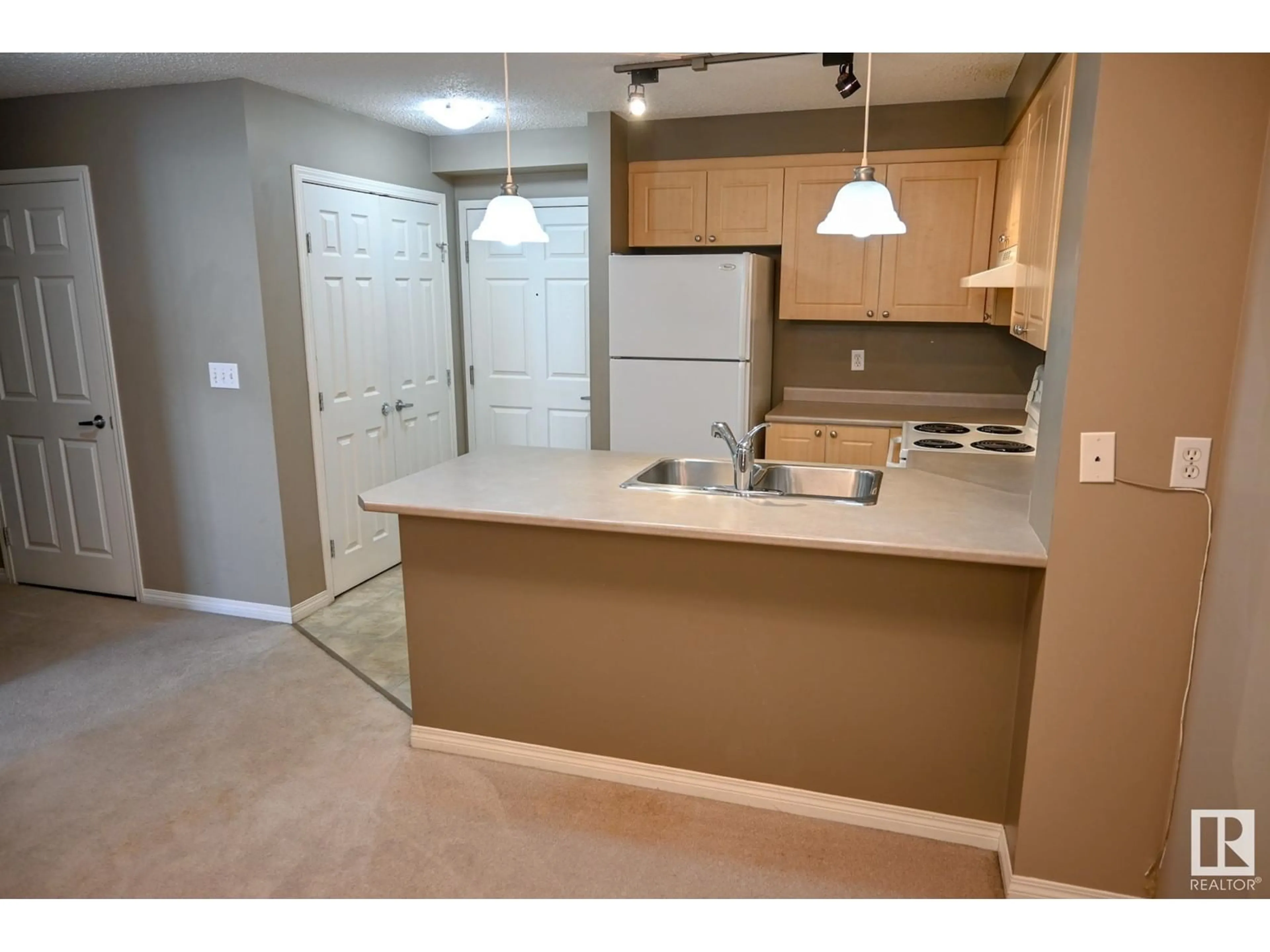 Standard kitchen, unknown for #211 616 MCALLISTER LO SW, Edmonton Alberta T6W1N1