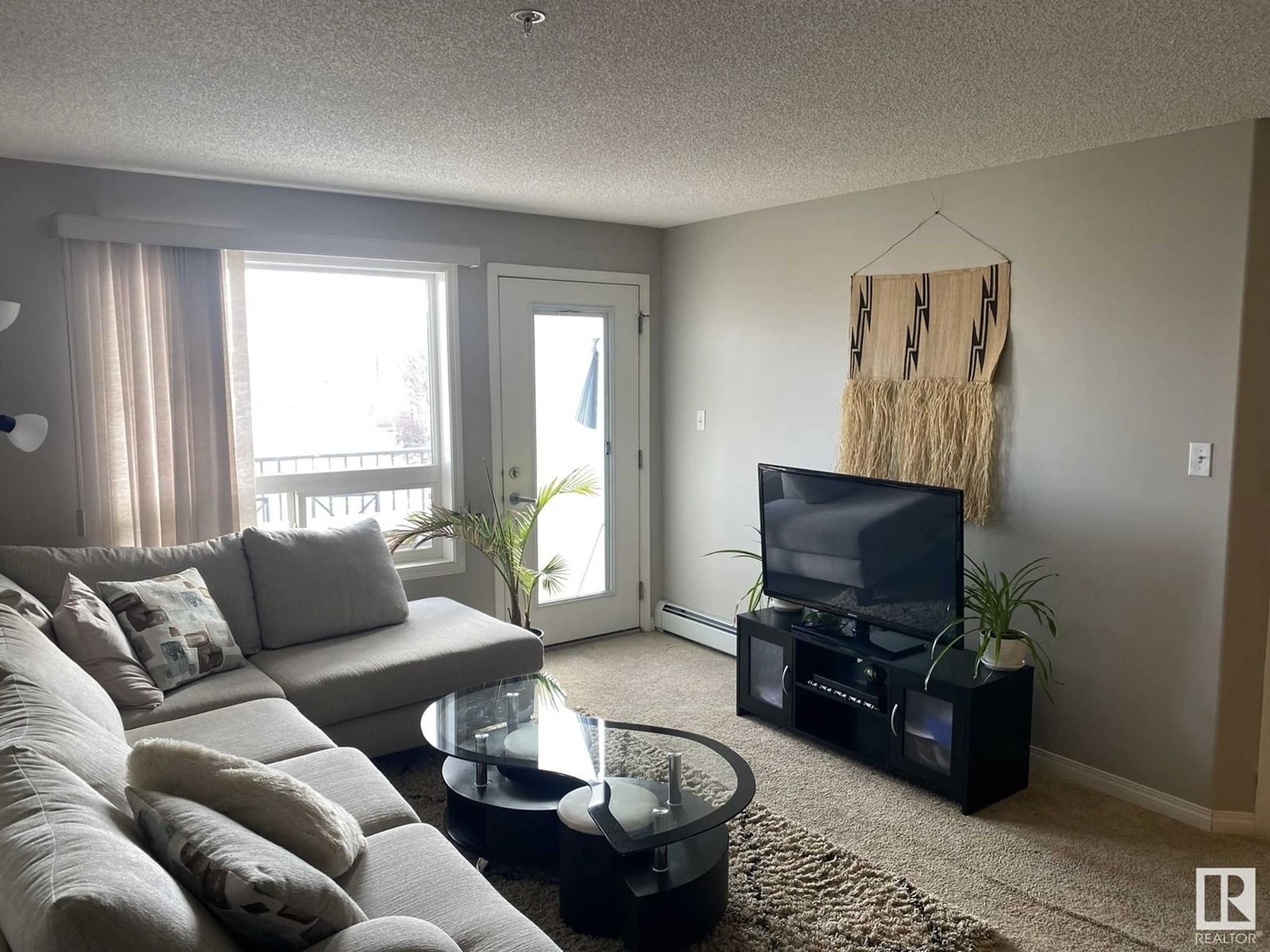 Living room with furniture, unknown for #2210 320 CLAREVIEW STATION DR NW, Edmonton Alberta T5Y0E5