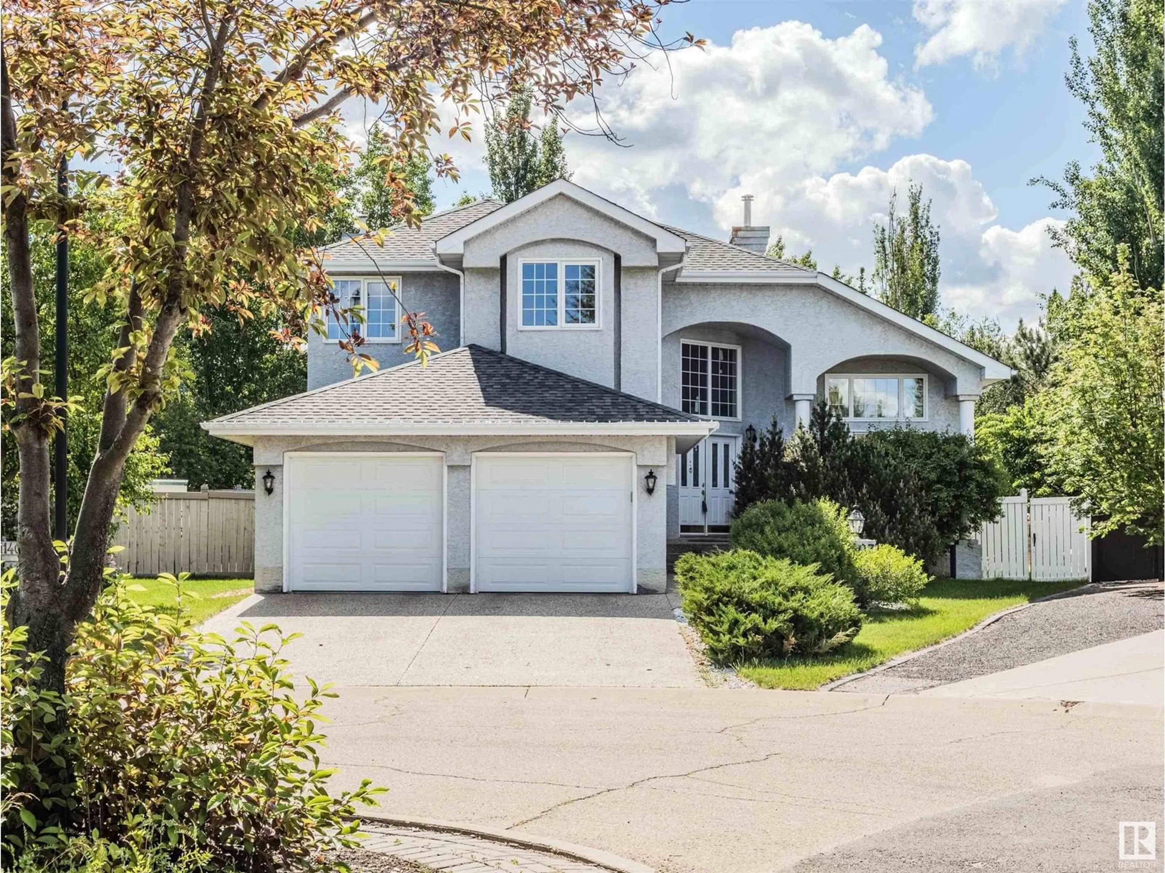 Home with vinyl exterior material, street for 11407 12 AV NW, Edmonton Alberta T6J6W8