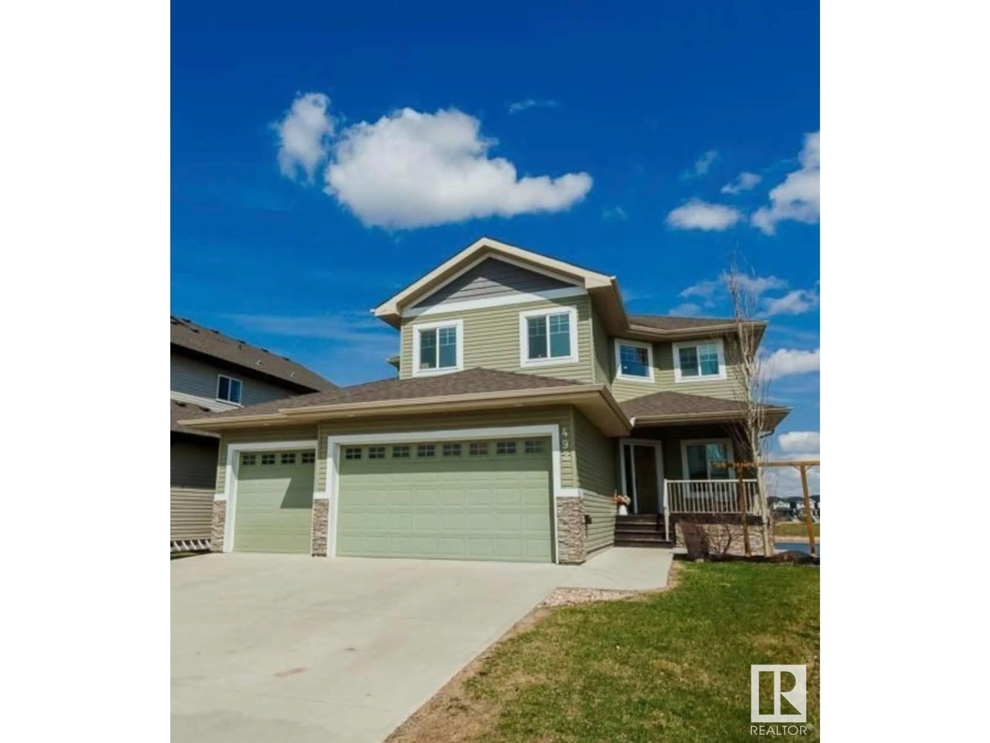 Home with vinyl exterior material, water/lake/river/ocean view for 492 REYNALDS WD, Leduc Alberta T9E0S8