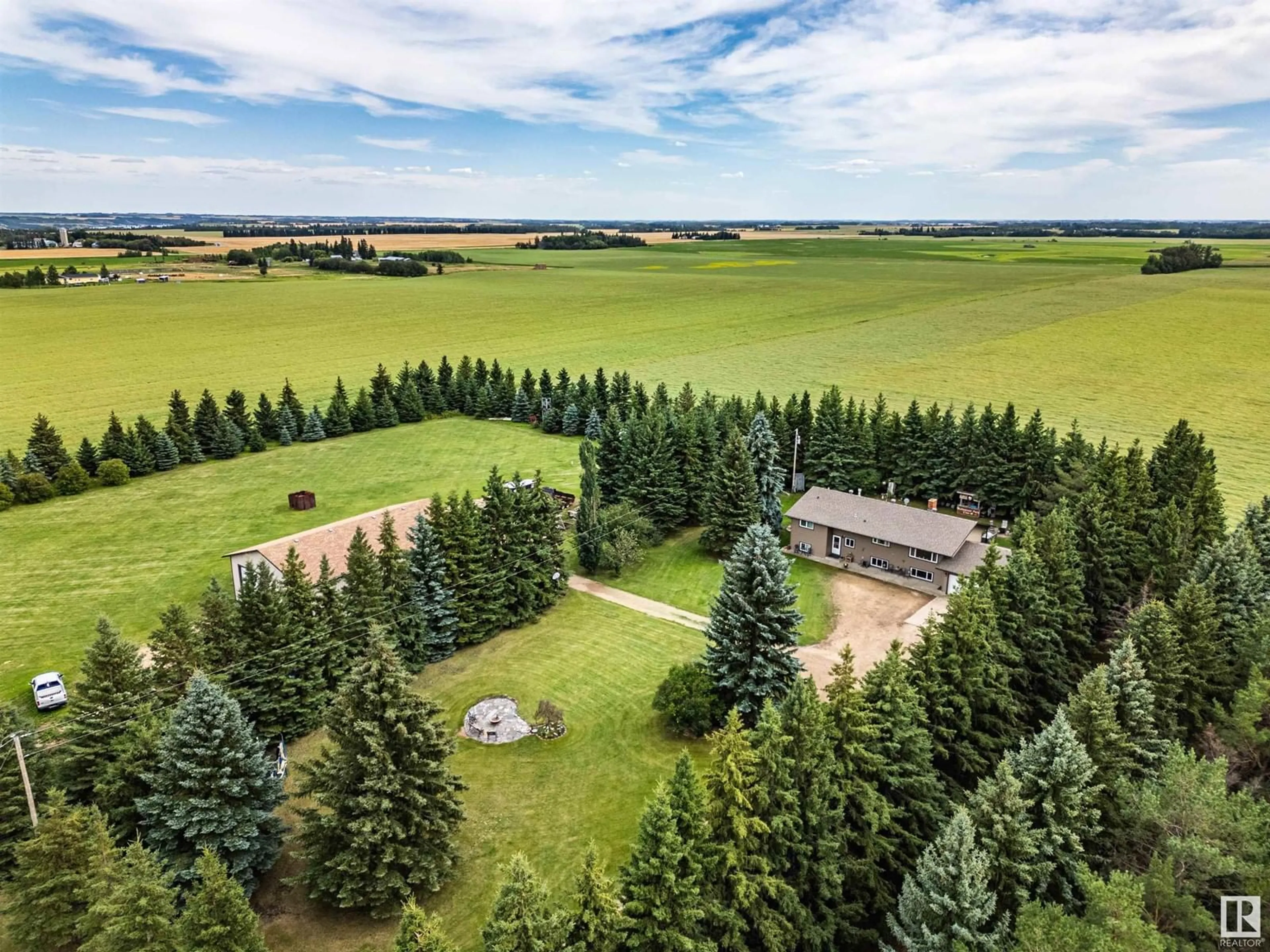 A pic from outside/outdoor area/front of a property/back of a property/a pic from drone, forest/trees view for 240049 TWP RD 480, Rural Wetaskiwin County Alberta T0C1Z0