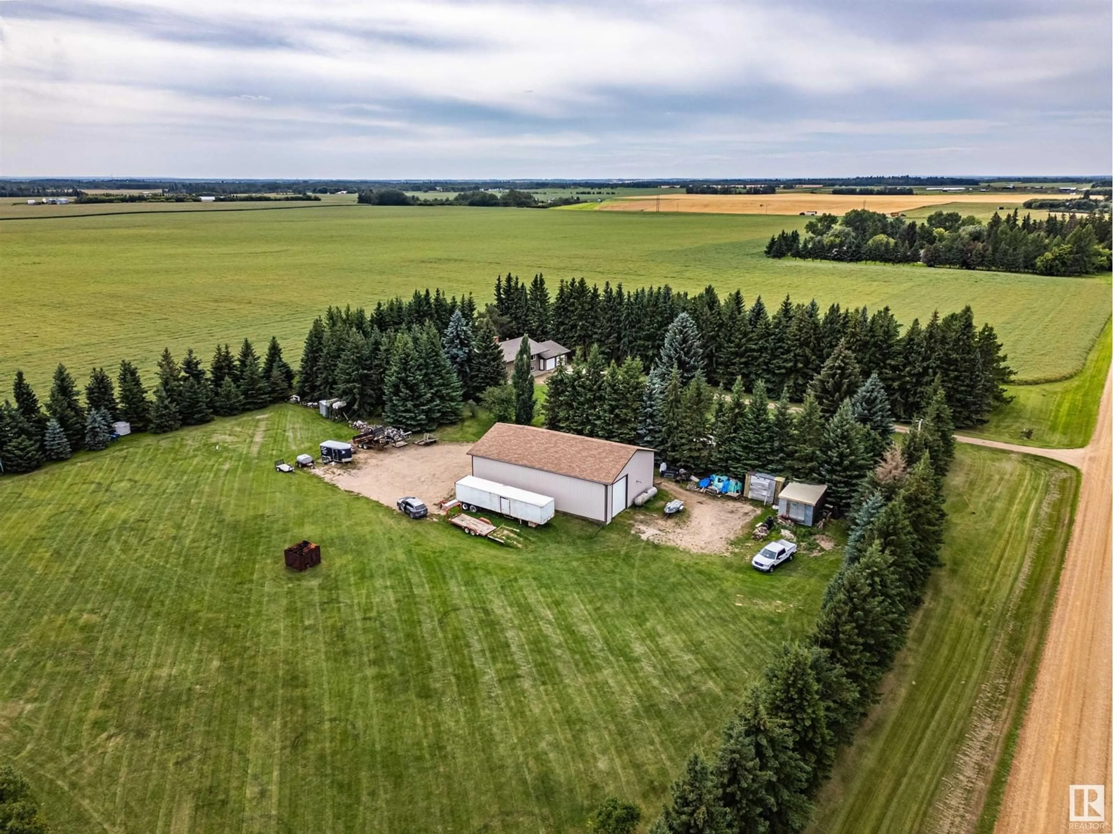 A pic from outside/outdoor area/front of a property/back of a property/a pic from drone, building for 240049 TWP RD 480, Rural Wetaskiwin County Alberta T0C1Z0