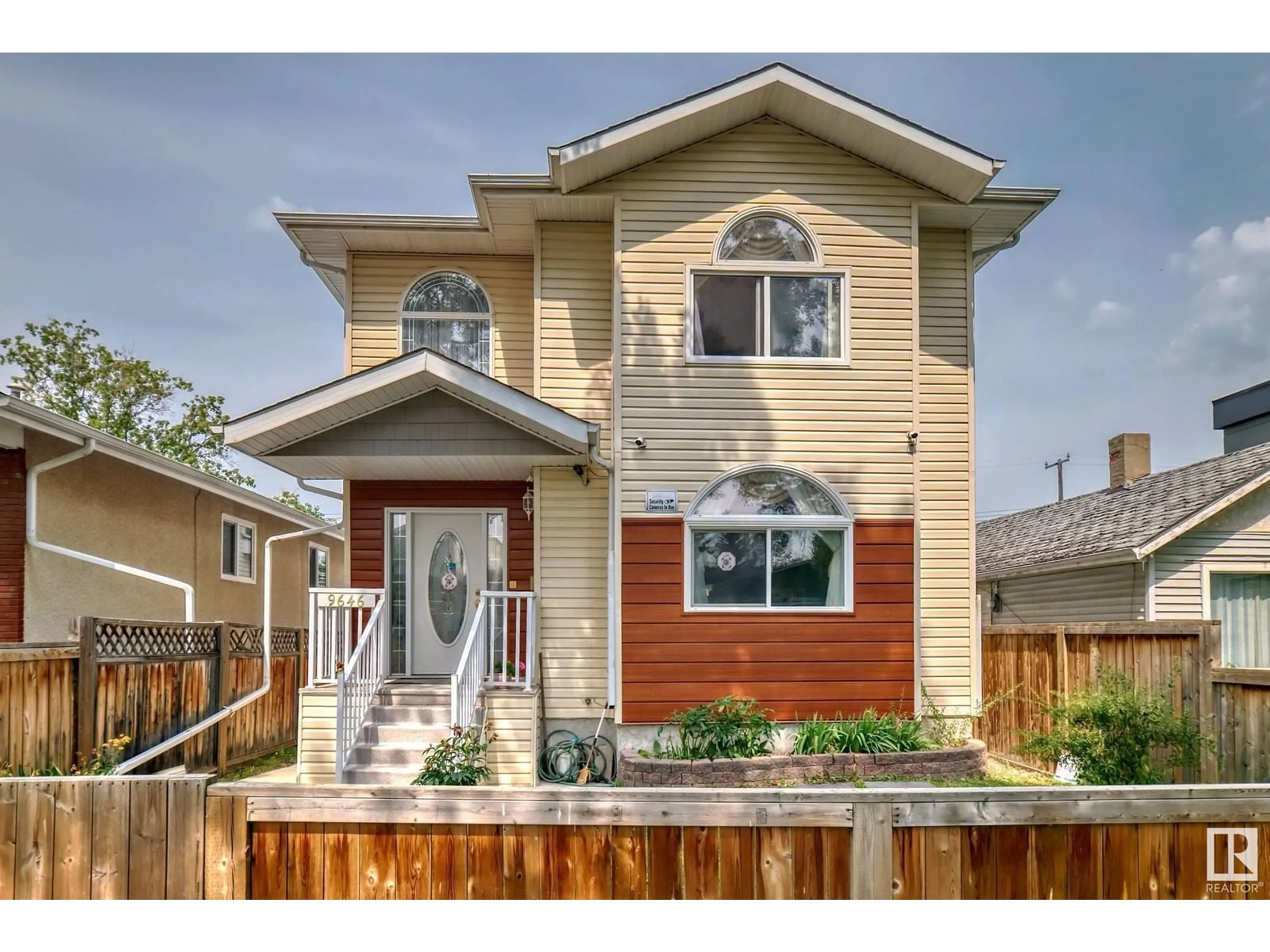 Home with vinyl exterior material, street for 9646 73 AV, Edmonton Alberta T6E1B2