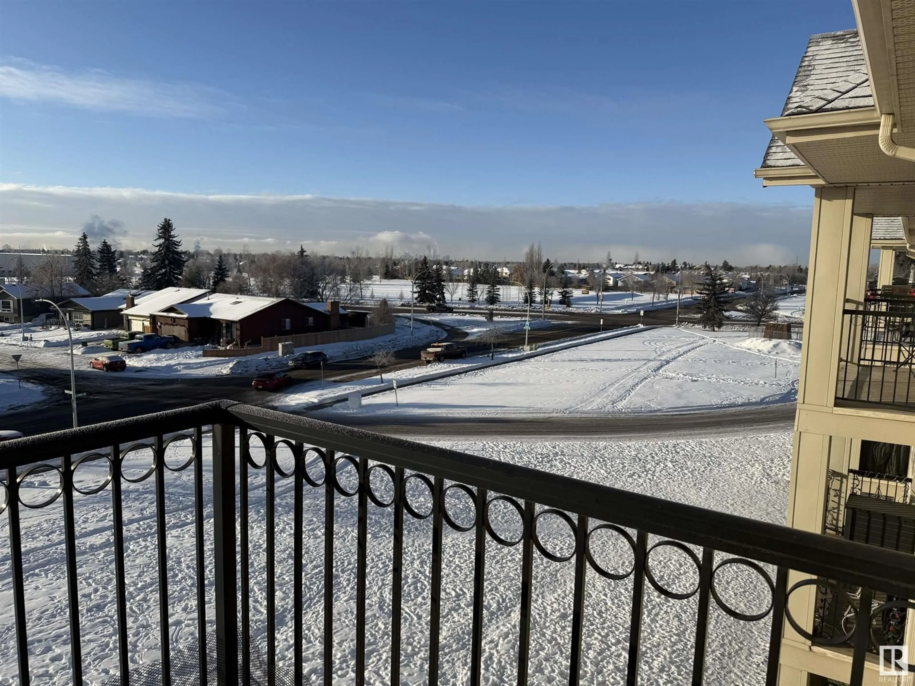 Balcony in the apartment, city buildings view from balcony for #409 592 HOOKE RD NW NW, Edmonton Alberta T5A5H2