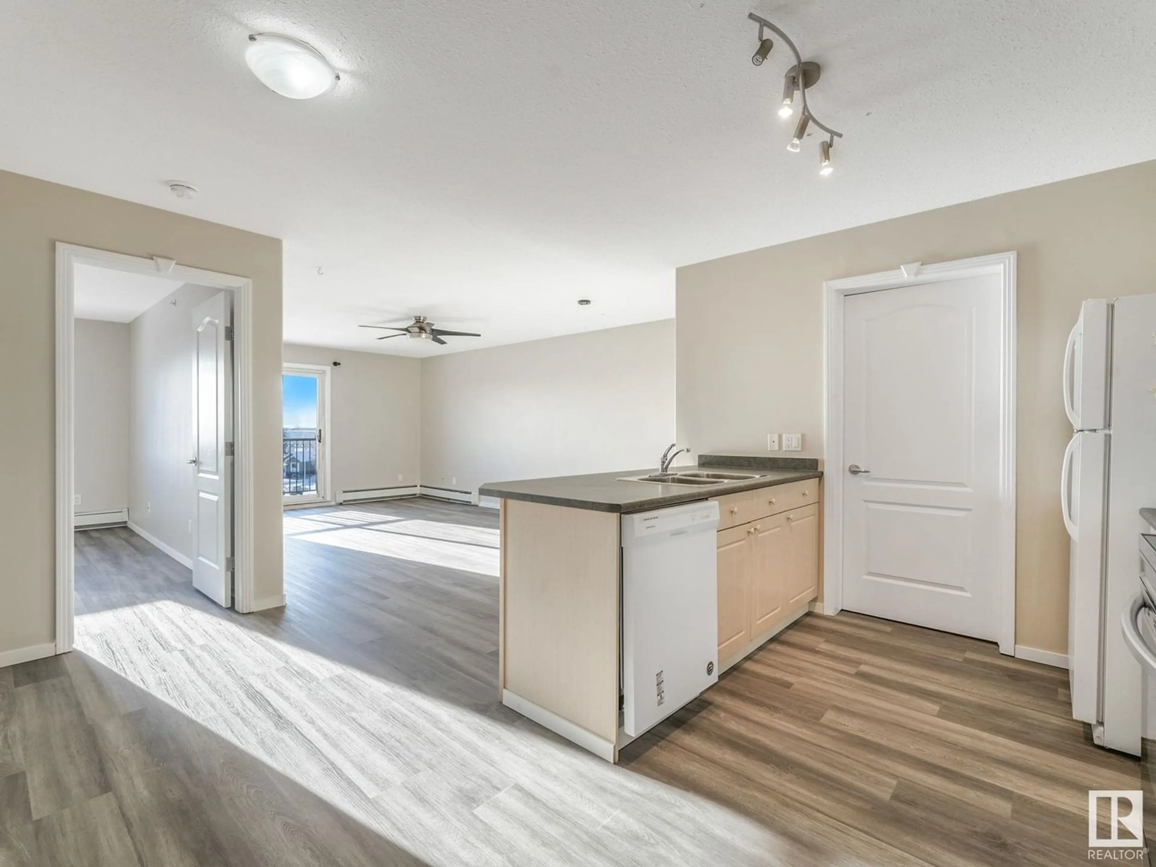 Open concept kitchen, unknown for #409 592 HOOKE RD NW NW, Edmonton Alberta T5A5H2