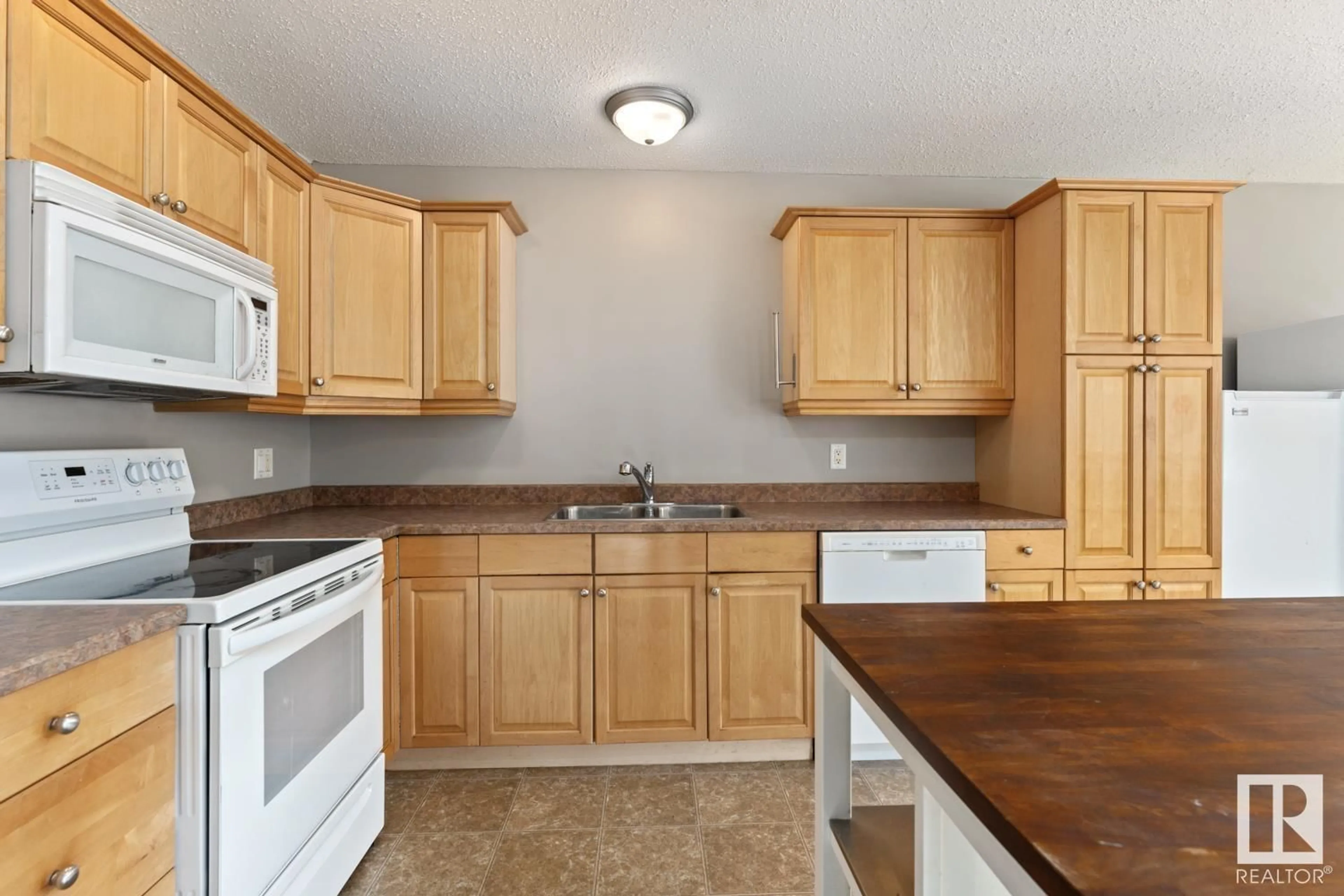 Standard kitchen, unknown for #102 4103 43 AV, Bonnyville Town Alberta T9N1W4