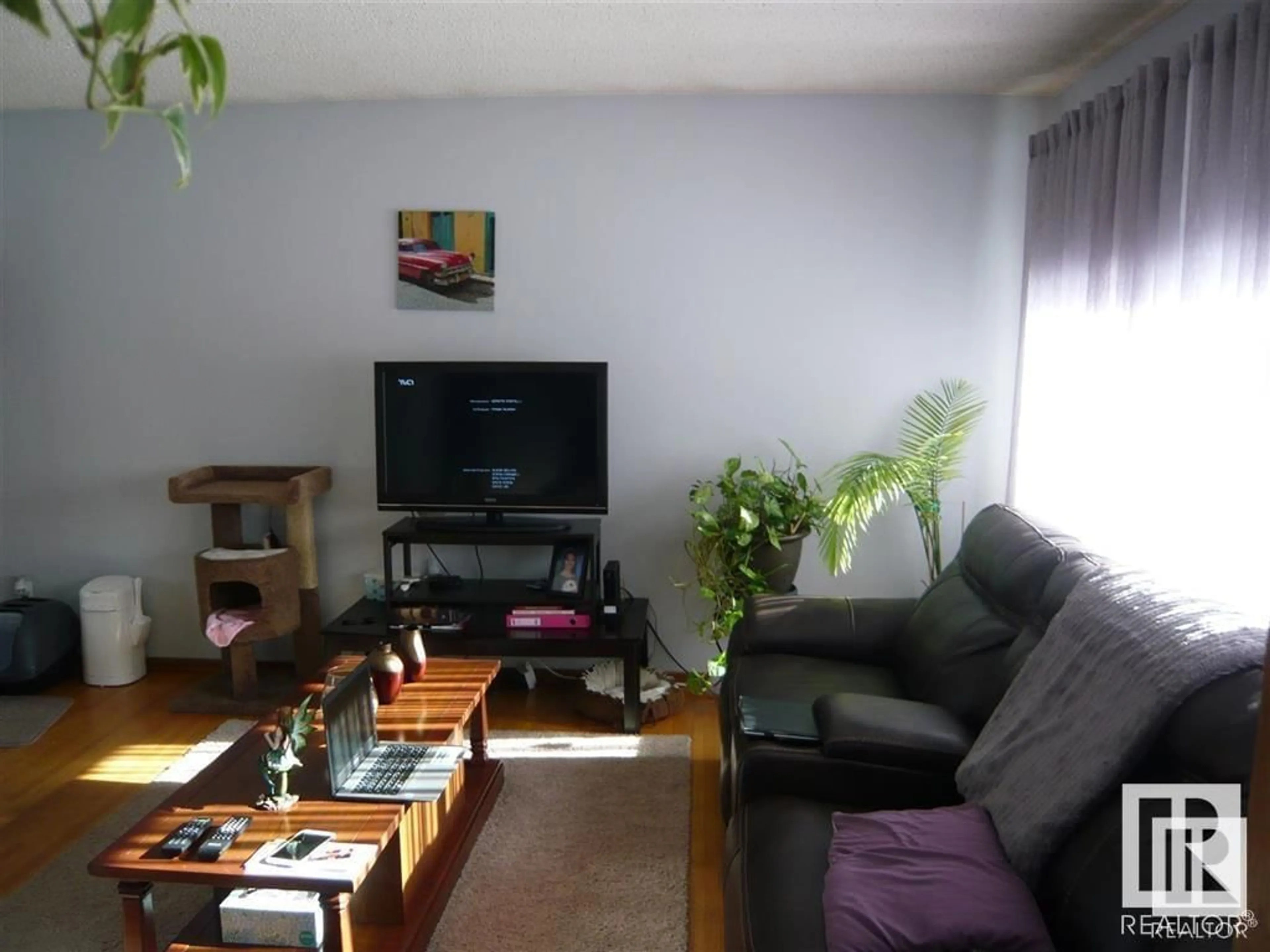 Living room with furniture, unknown for 10428 136 AV NW, Edmonton Alberta T5E1W3