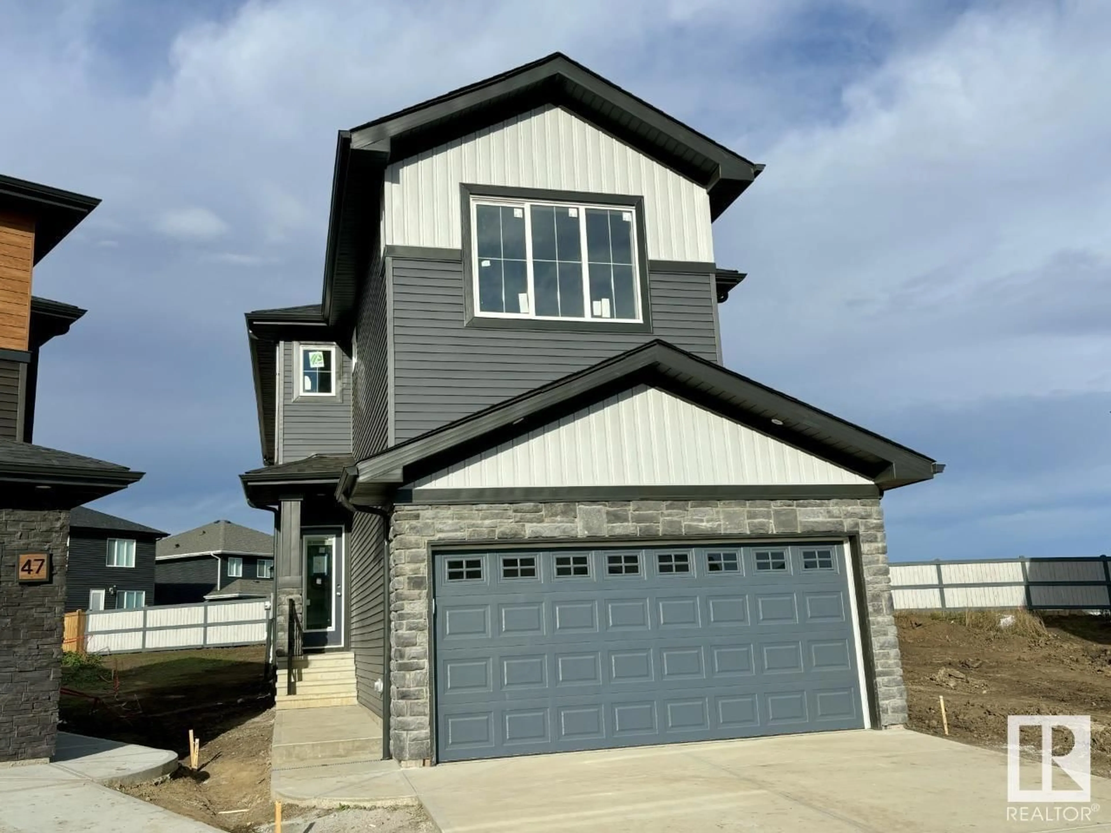 Home with vinyl exterior material, street for 49 ASHBURY CR, Spruce Grove Alberta T7X3C6