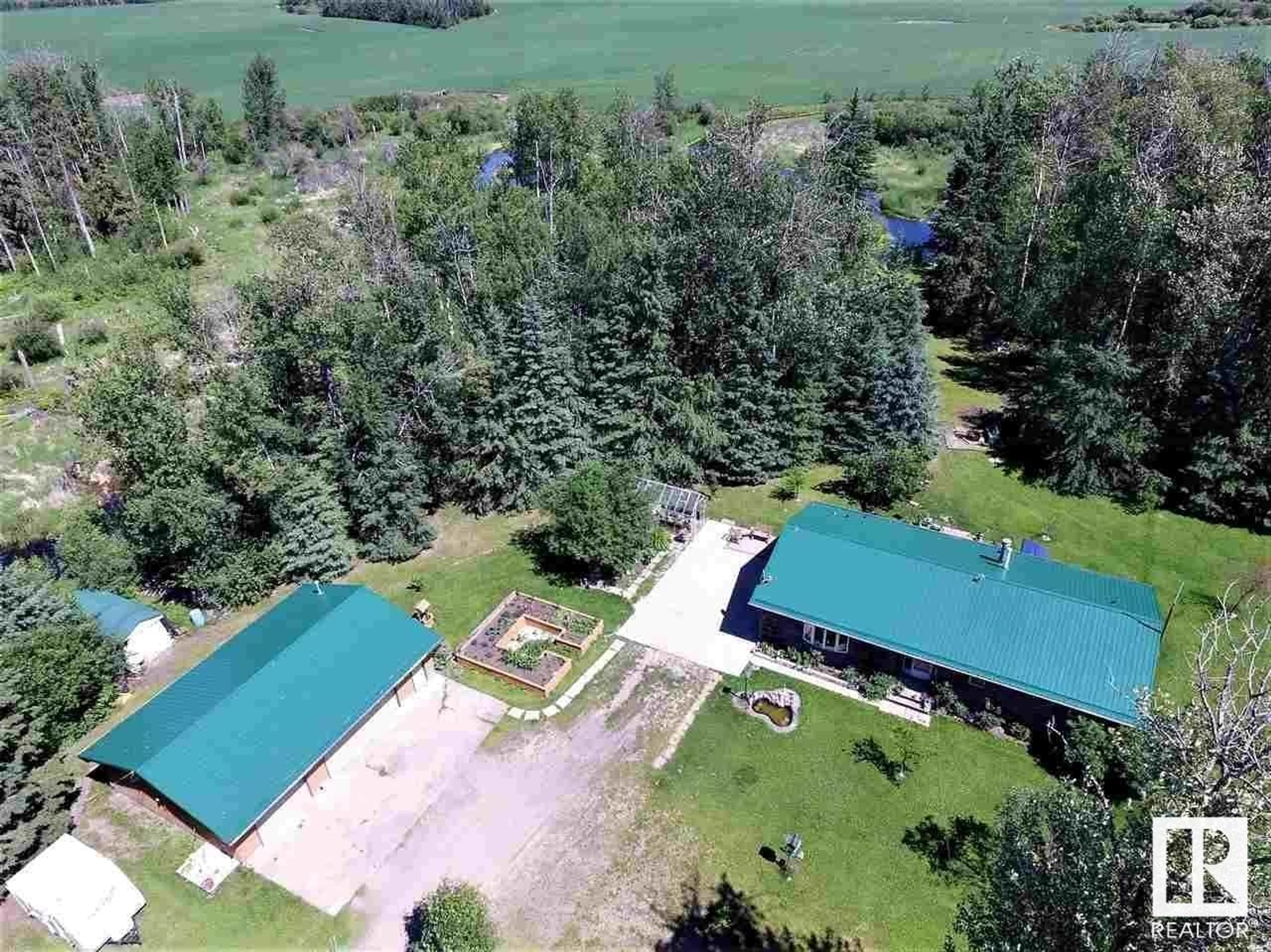 A pic from outside/outdoor area/front of a property/back of a property/a pic from drone, unknown for 55103 RGE ROAD 25, Rural Lac Ste. Anne County Alberta T0E1V0