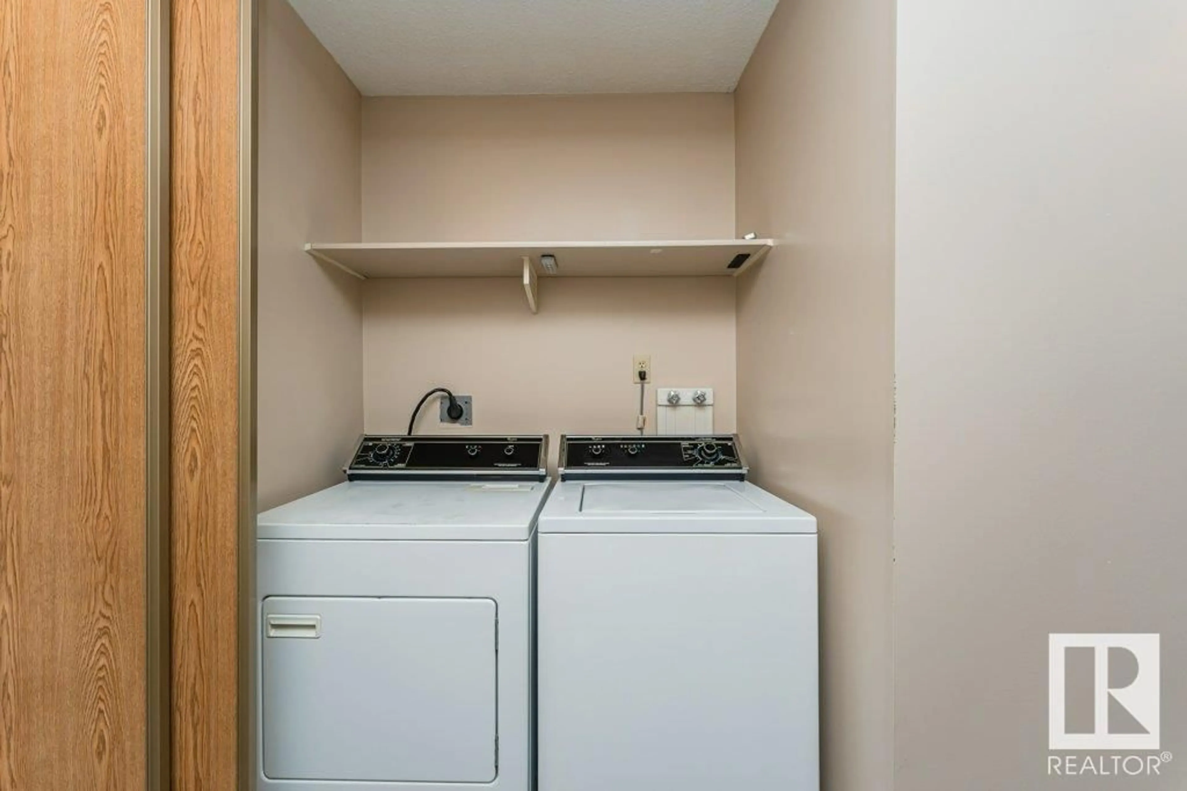 Laundry room for 10672 153 AV NW, Edmonton Alberta T5X5R7