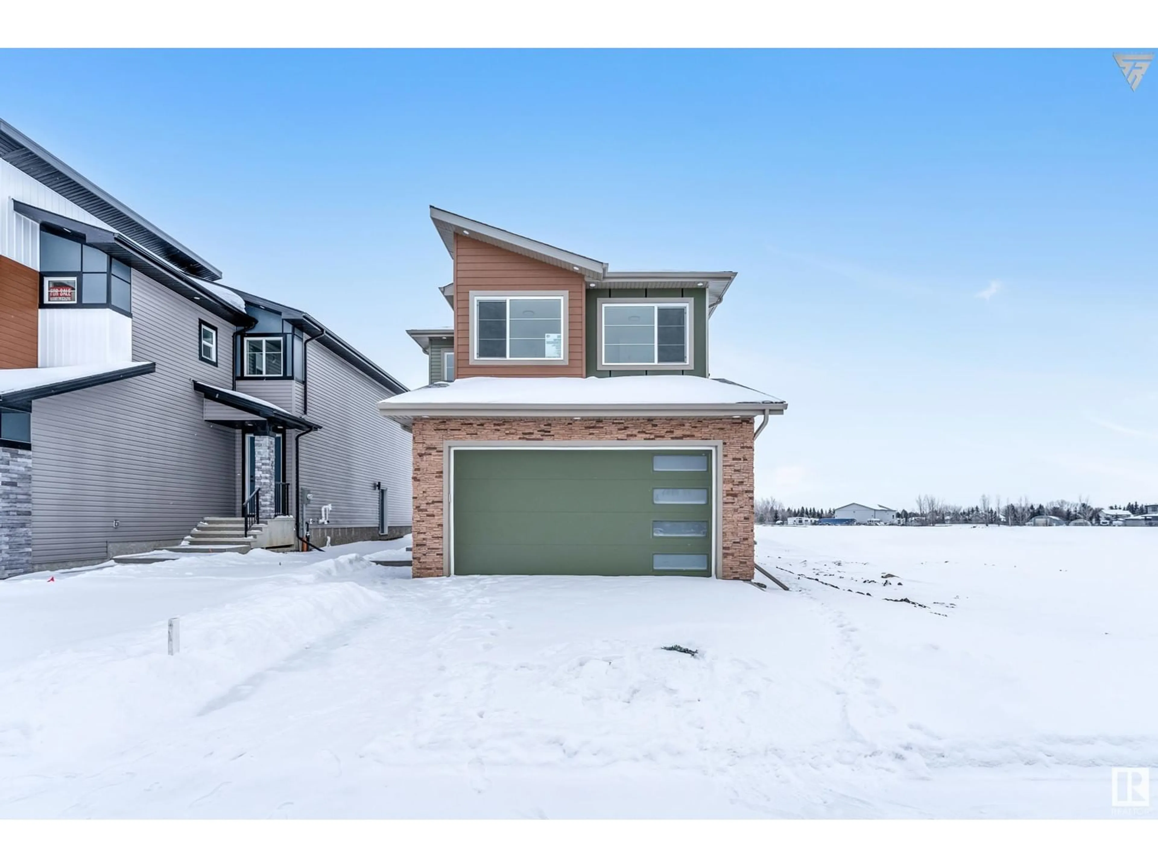 Home with brick exterior material, street for 6327 17 ST NE, Rural Leduc County Alberta T4X0P5