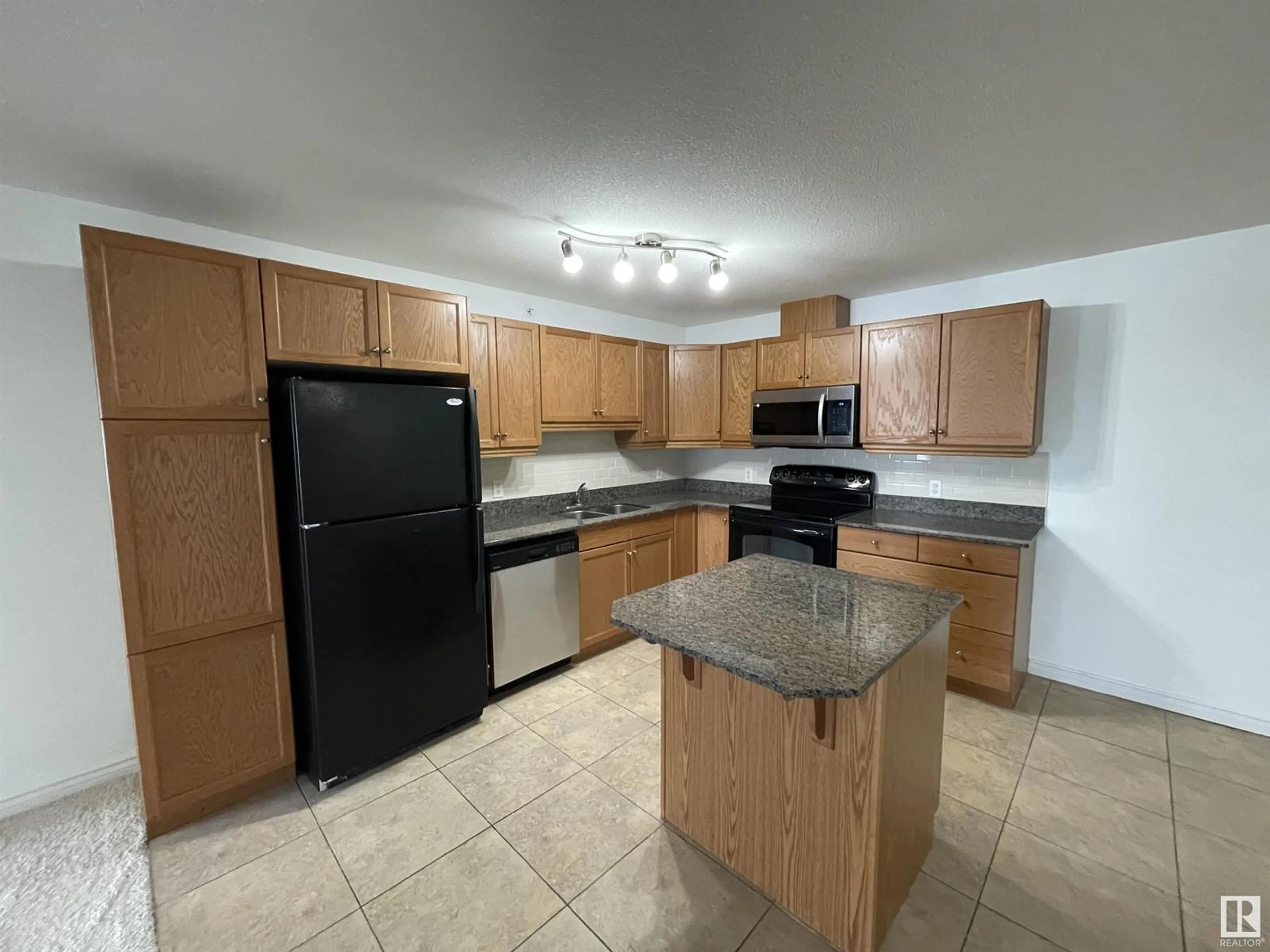 Standard kitchen, unknown for #451 2096 BLACKMUD CREEK DR SW, Edmonton Alberta T6W0G1