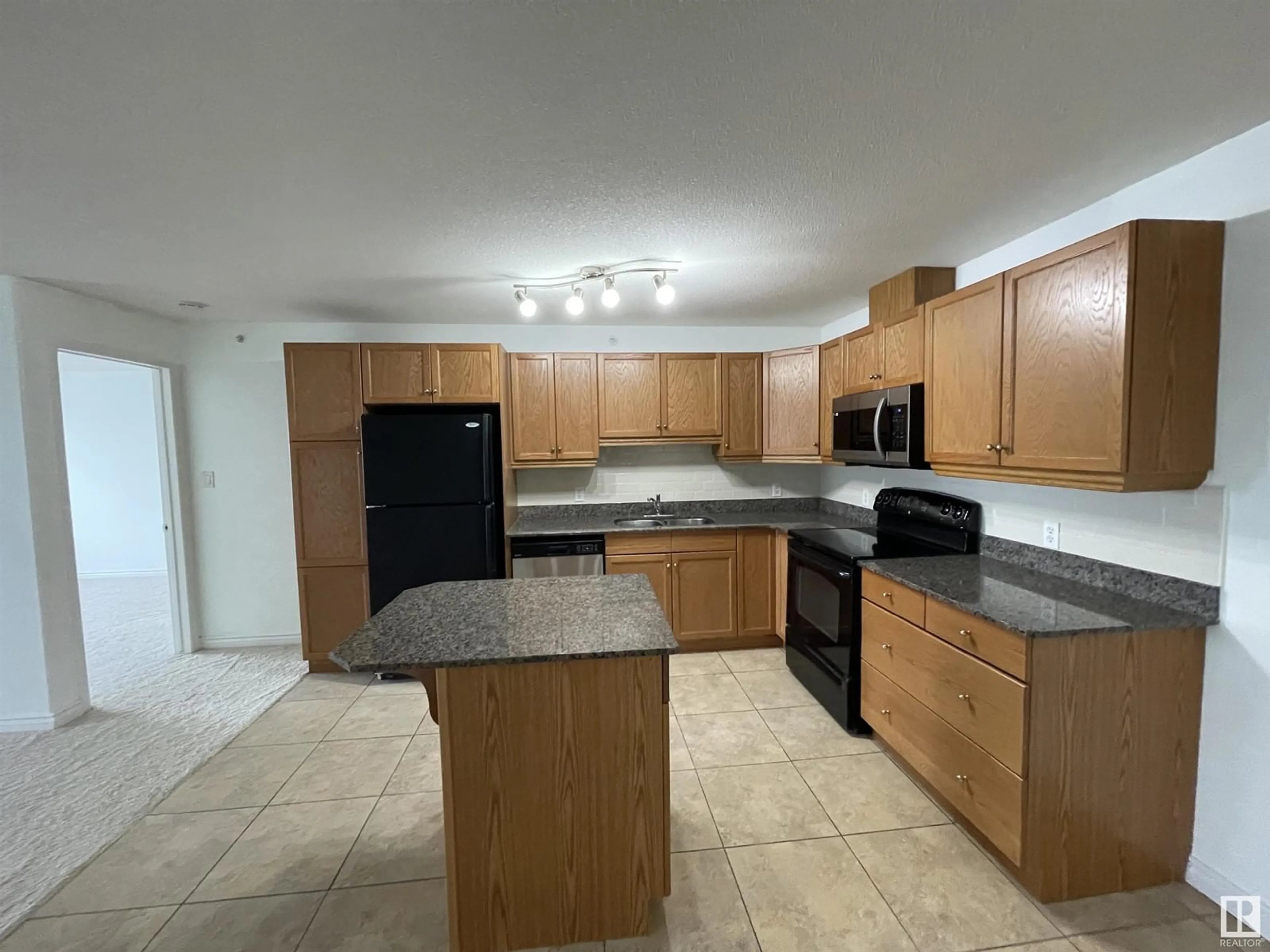 Standard kitchen, unknown for #451 2096 BLACKMUD CREEK DR SW, Edmonton Alberta T6W0G1