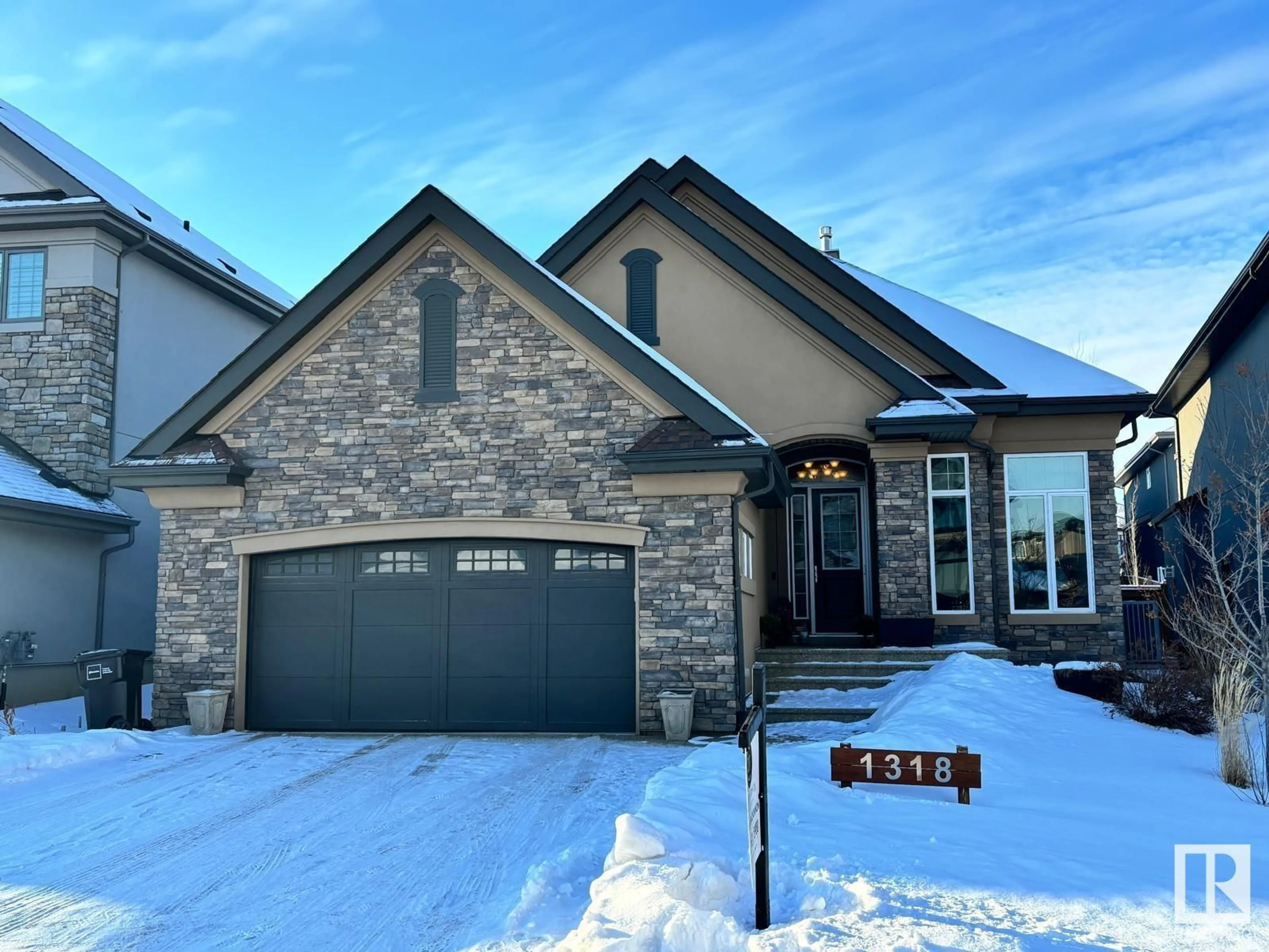 Home with brick exterior material, street for 1318 Hainstock WY SW SW, Edmonton Alberta T6W3B6