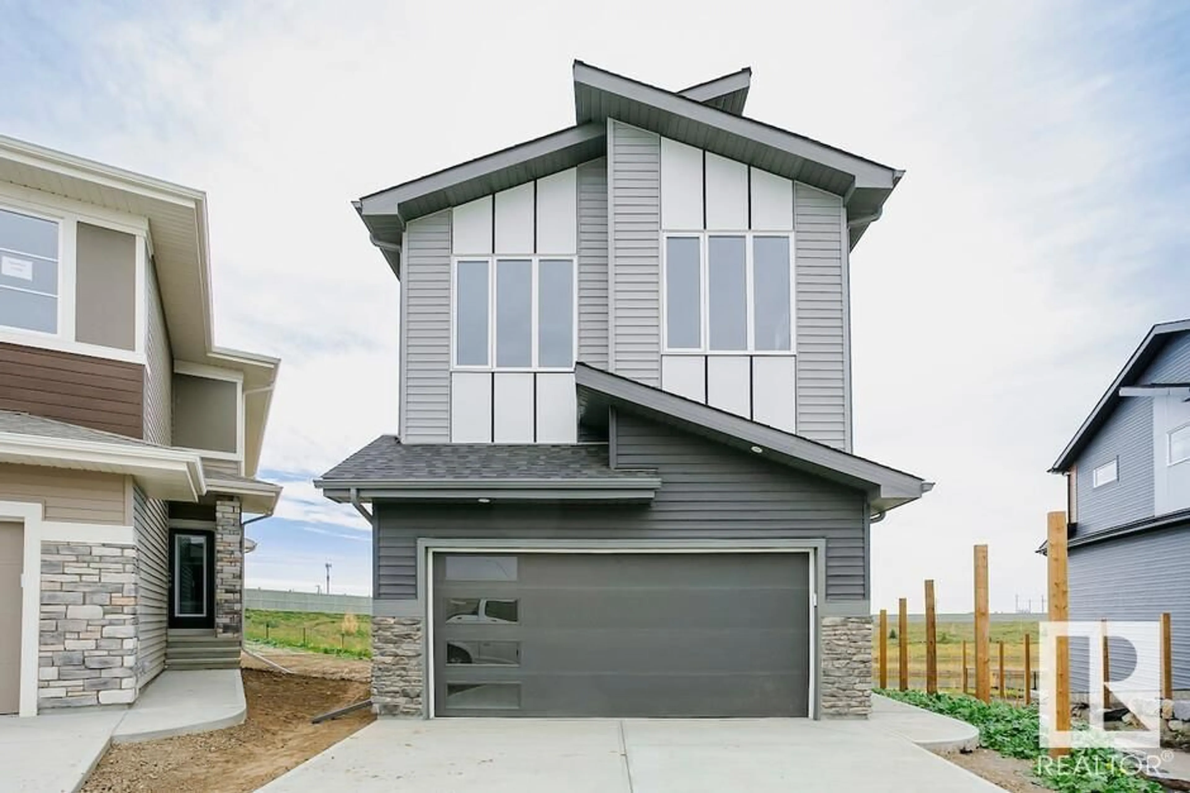 Home with vinyl exterior material, street for 19 GAMBEL LO, Spruce Grove Alberta T7X0Y5