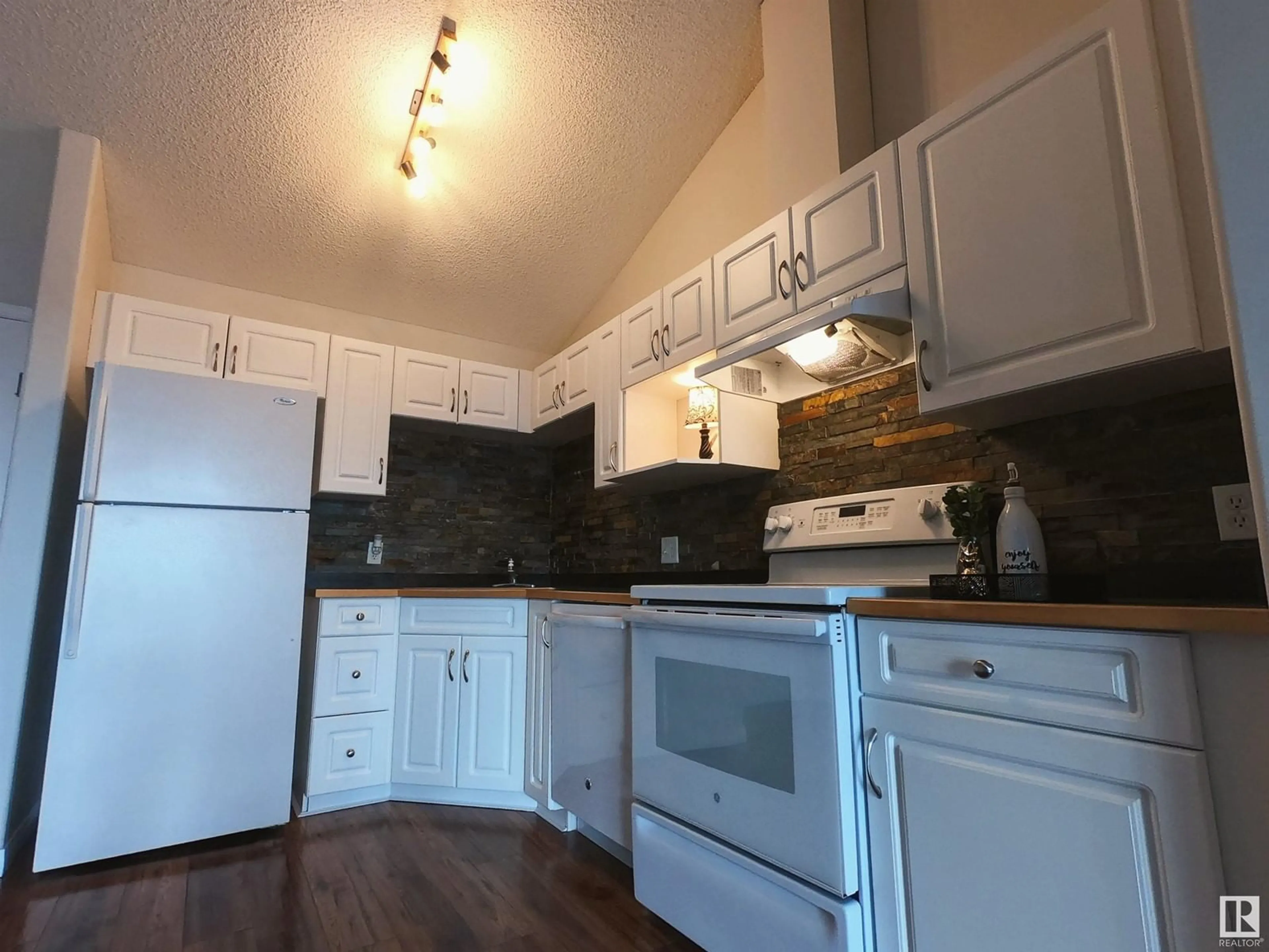 Standard kitchen, wood/laminate floor for #439 3425 19 ST NW, Edmonton Alberta T6T2B5